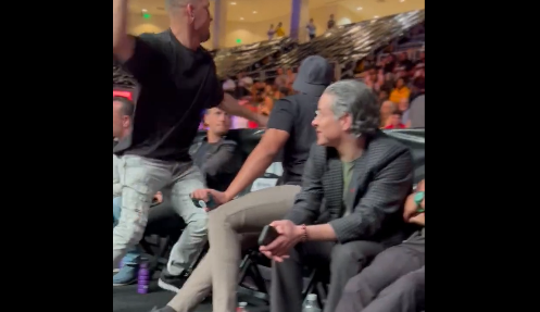 Nate Diaz throwing a water bottle at Chase DeMoor. Credit: Misfits Boxing/Twitter