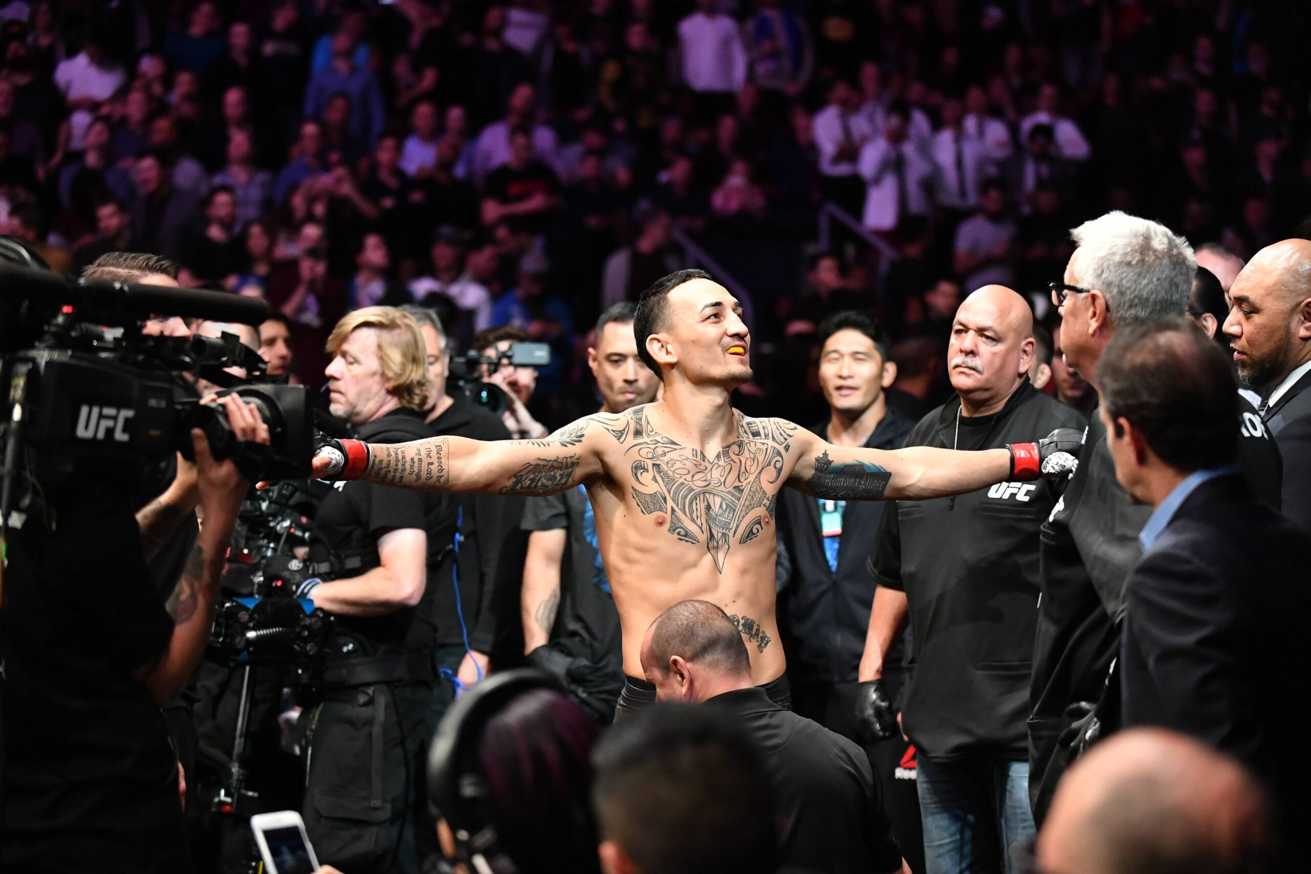 Max Holloway walks out for UFC 231.
