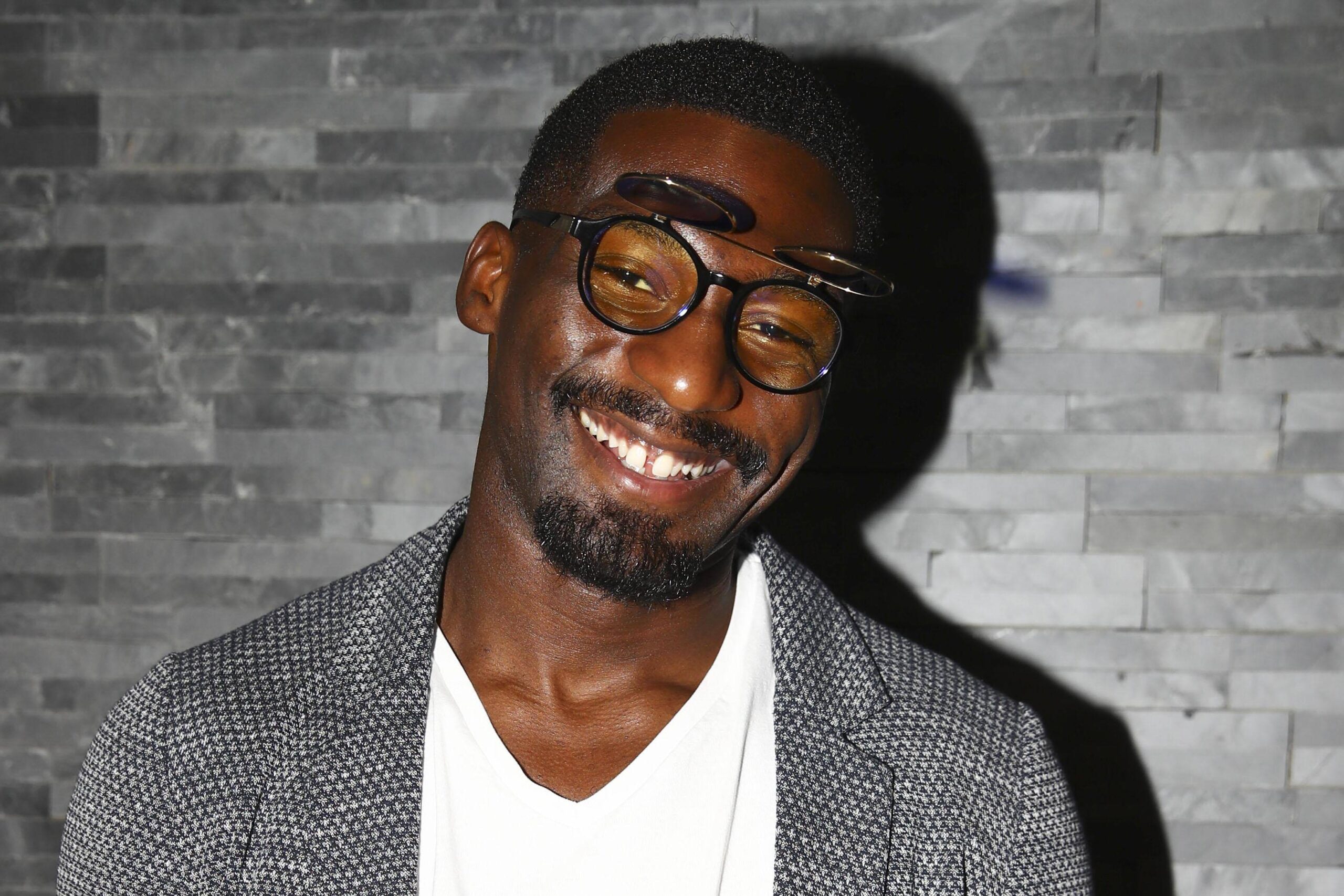 Glory kickboxing star Cedric Doumbe poses for the camera at a 2019 event.