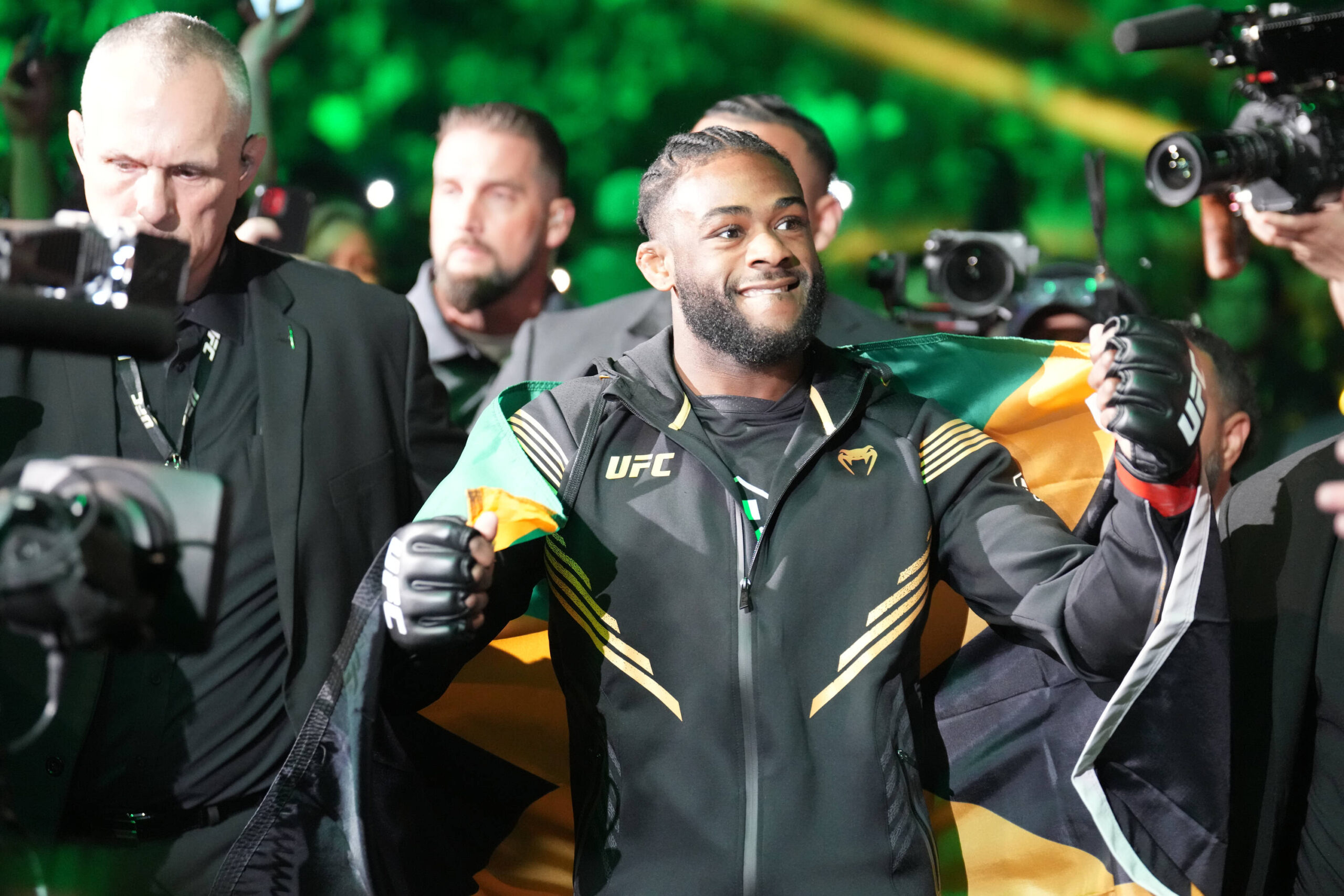 Aljamain Sterling walking out to the Octagon at UFC 273, IMAGO/Photographer Louis Grasse.
