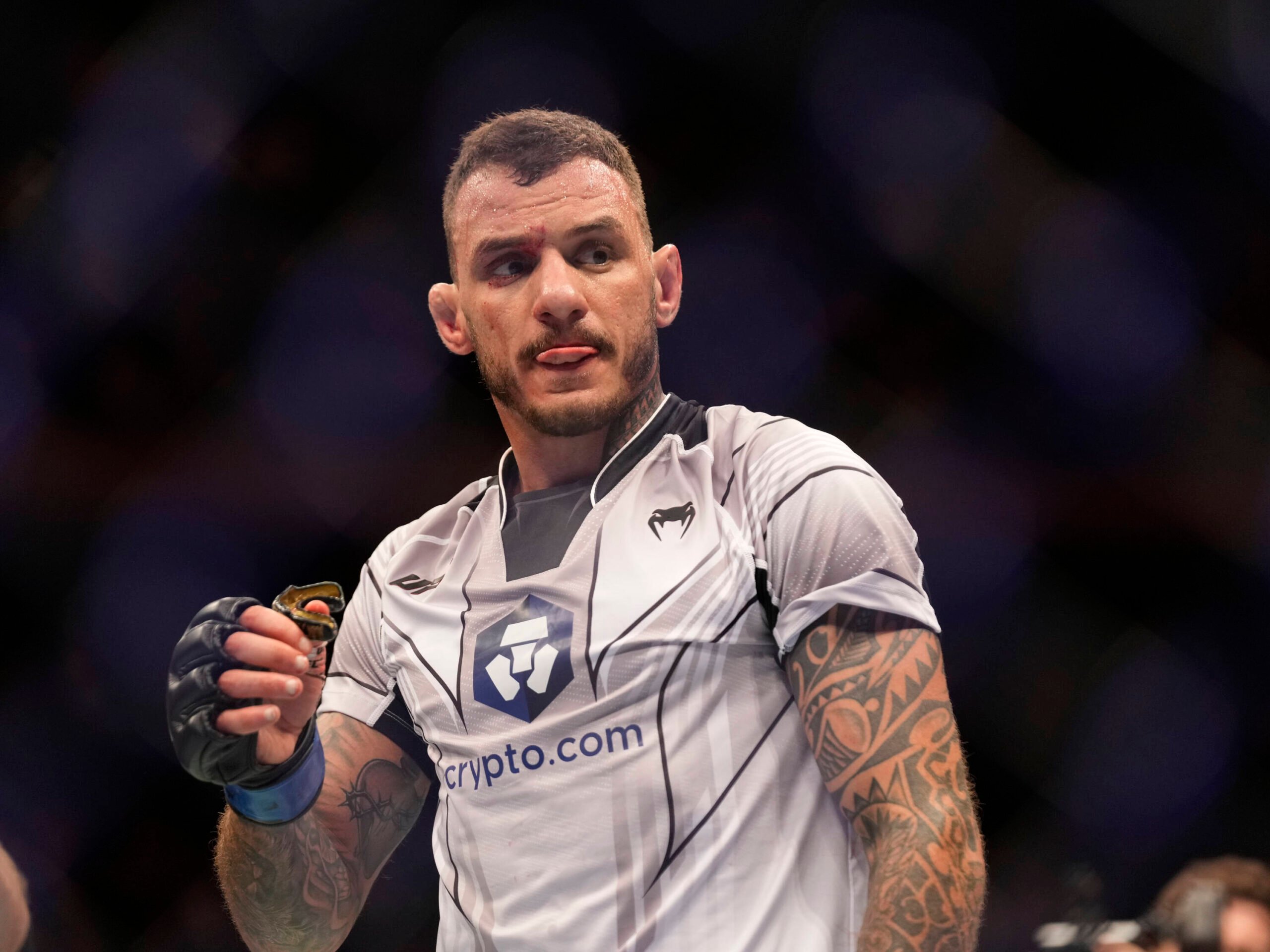 Renato Moicano poses after a victory at UFC 281.