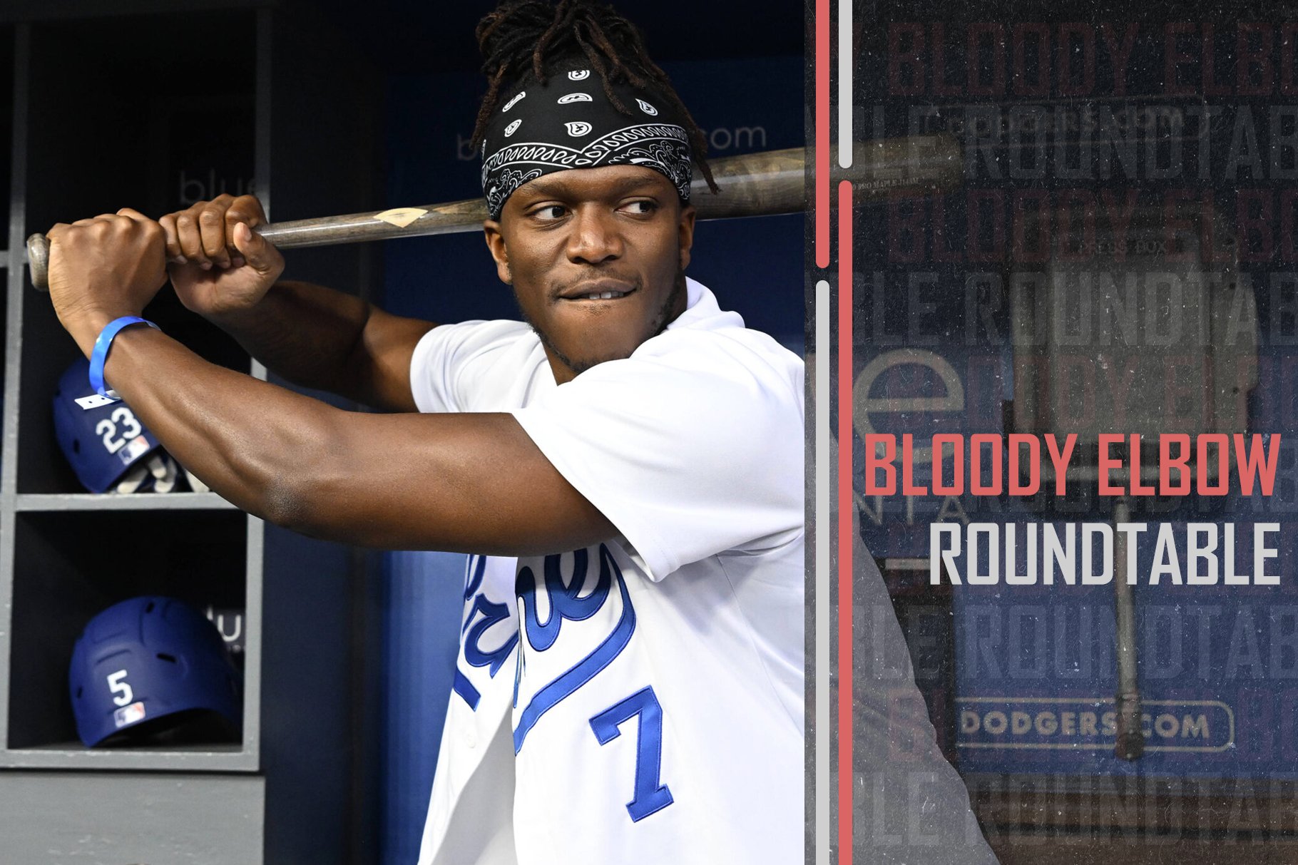Online influencer KSI at Dodger Stadium holding a bat in the dugout.