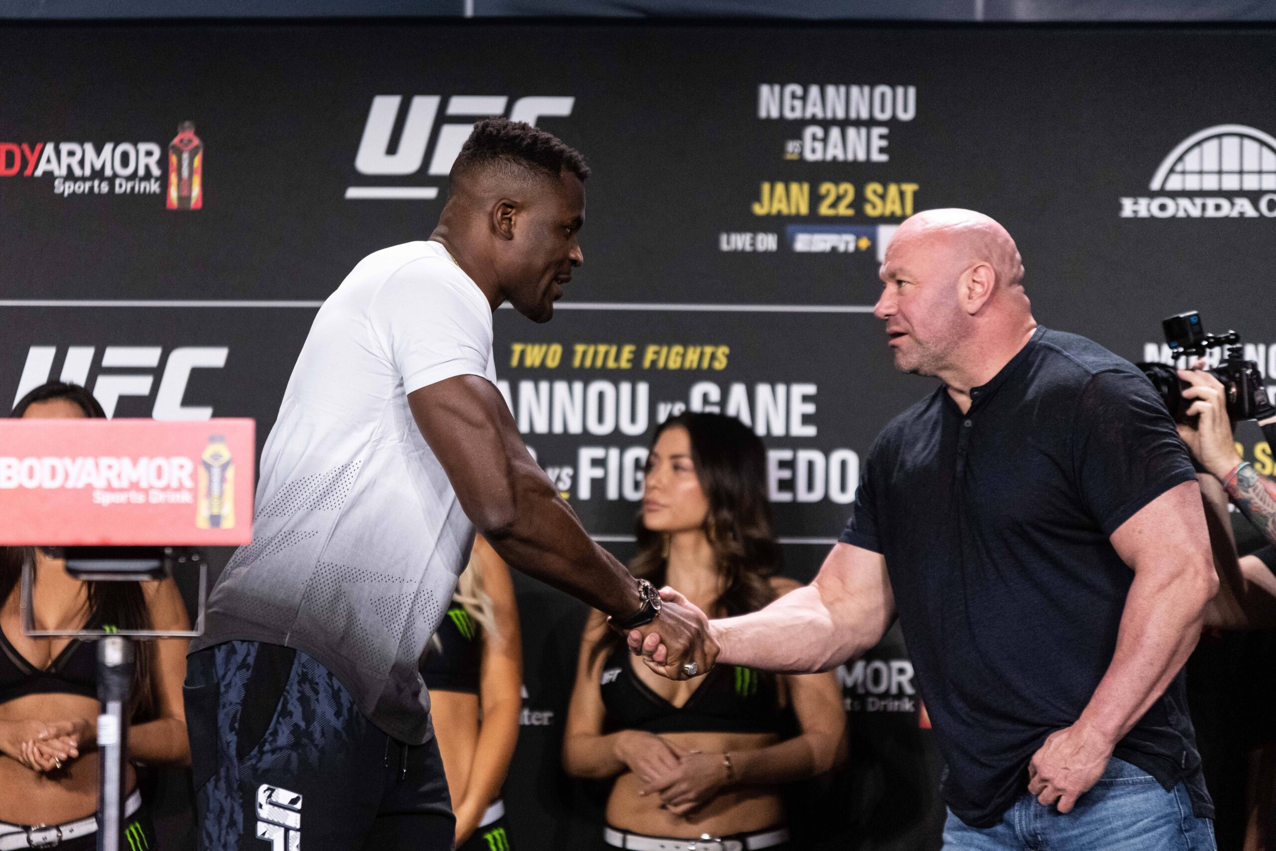 Francis Ngannou greets UFC president Dana White.