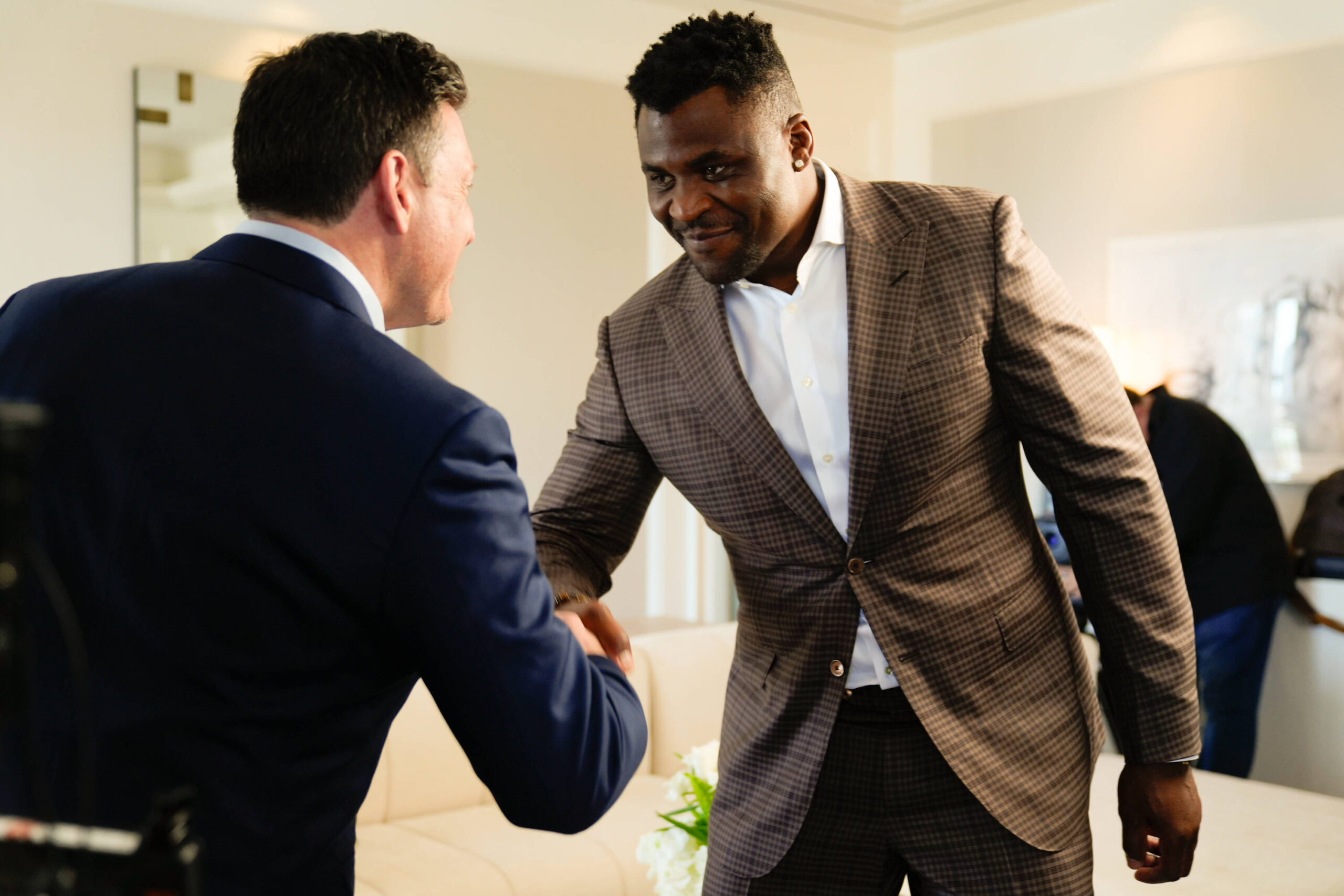 Francis Ngannou meets with PFL CEO Peter Murray.