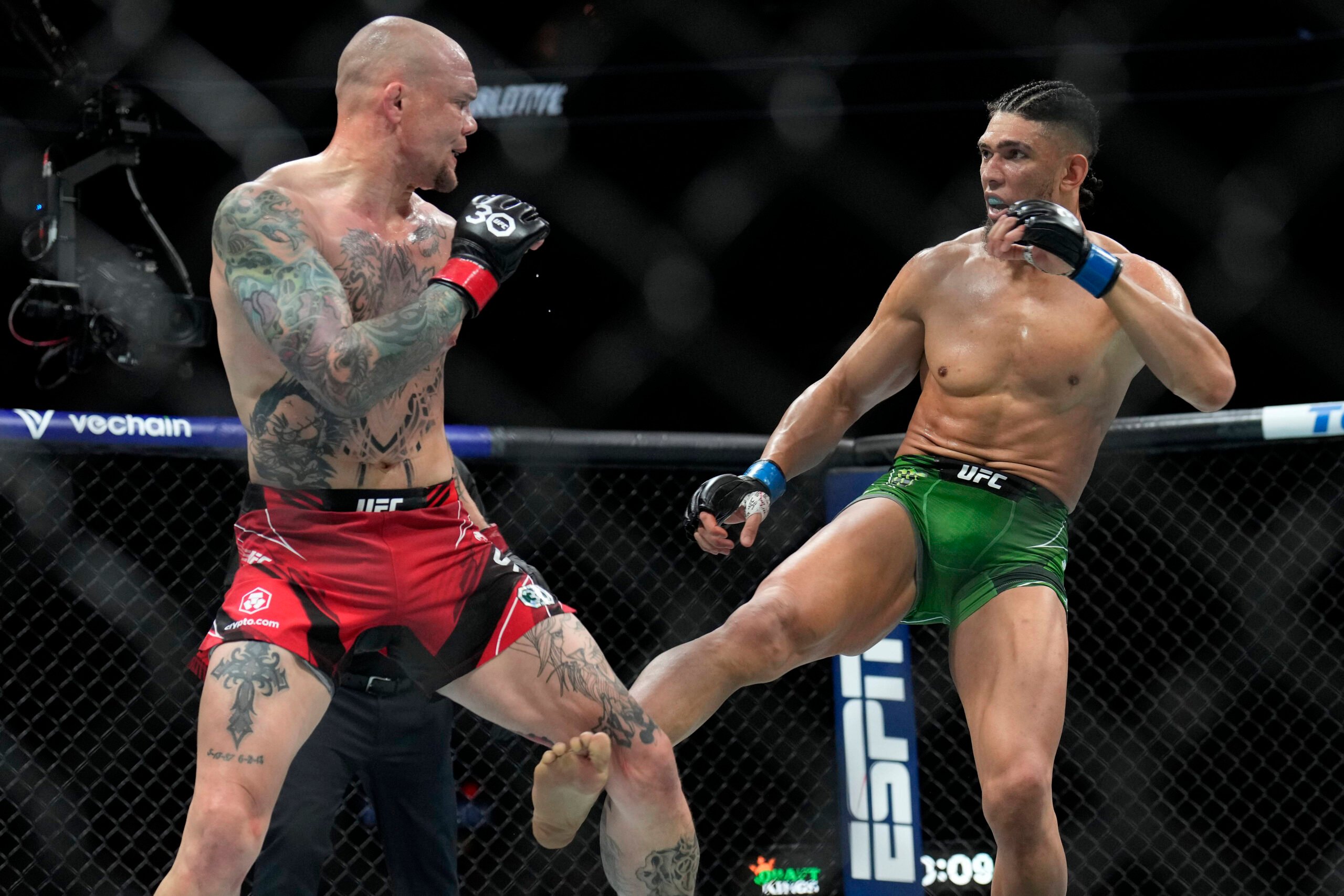 Anthony Smith absorbs a leg kick from Johnny Walker at UFC on ABC 4.