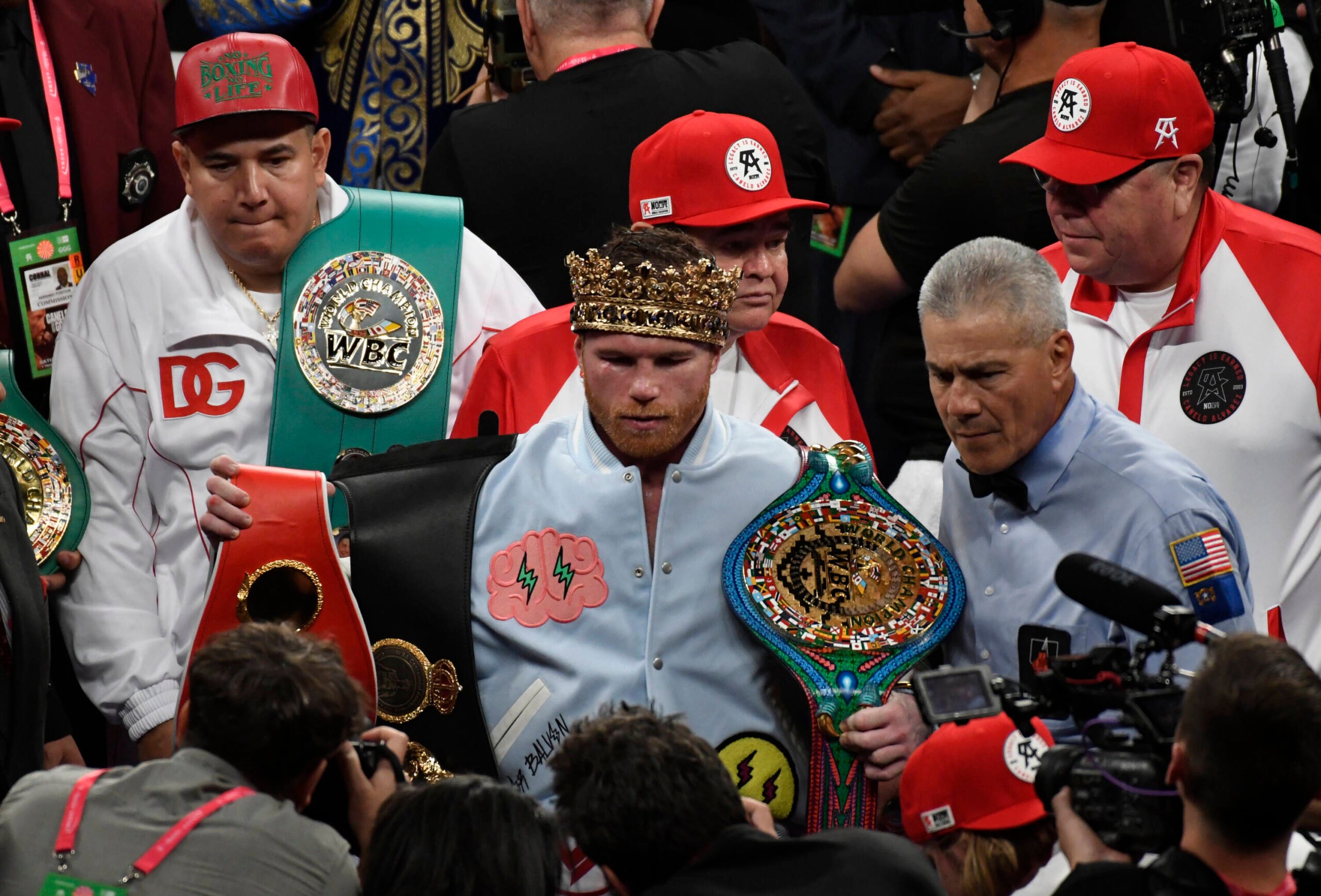Canelo Alvarez with his belts