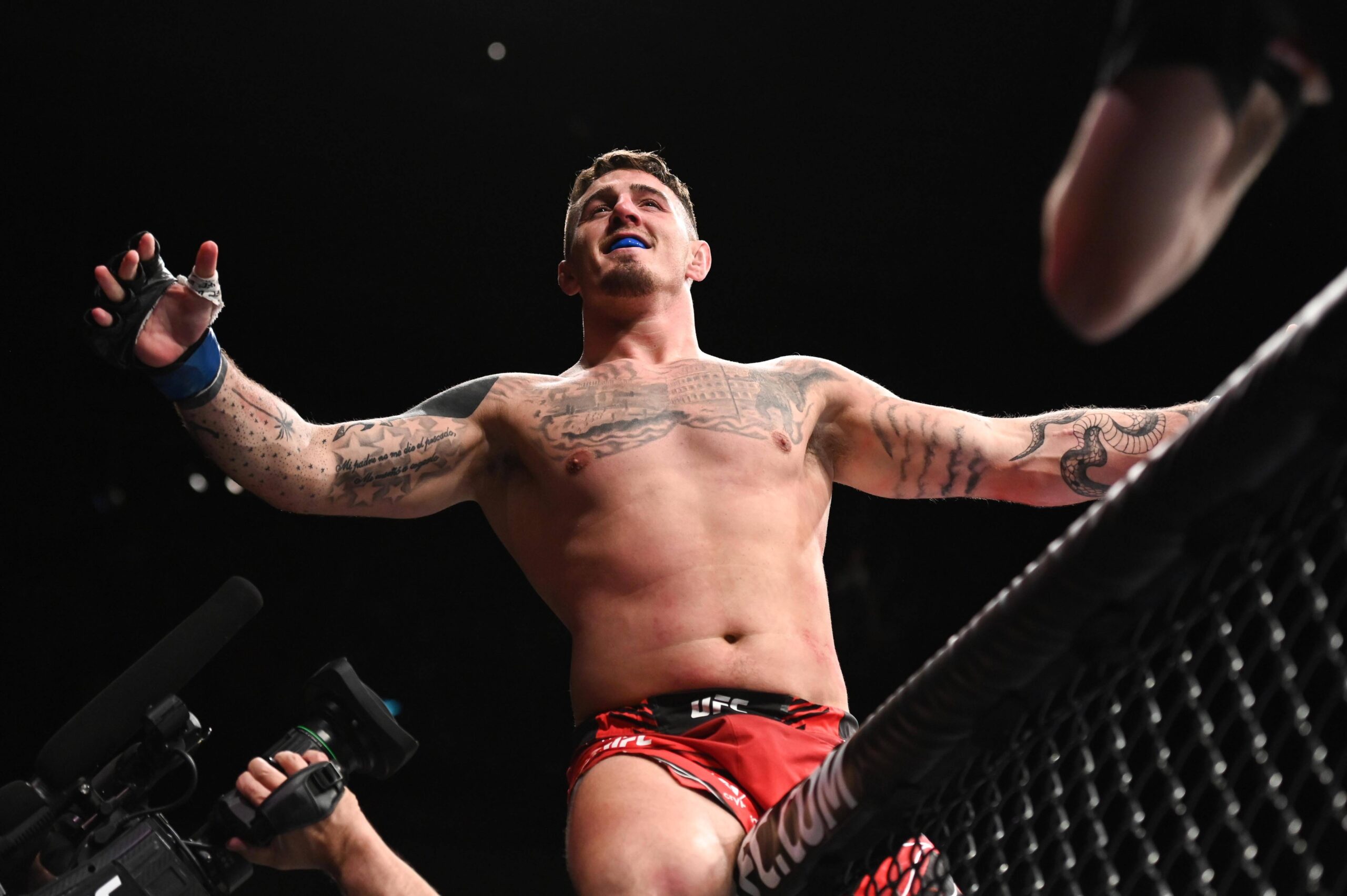 UFC heavyweight Tom Aspinall celebrates his win at UFC London in 2022.