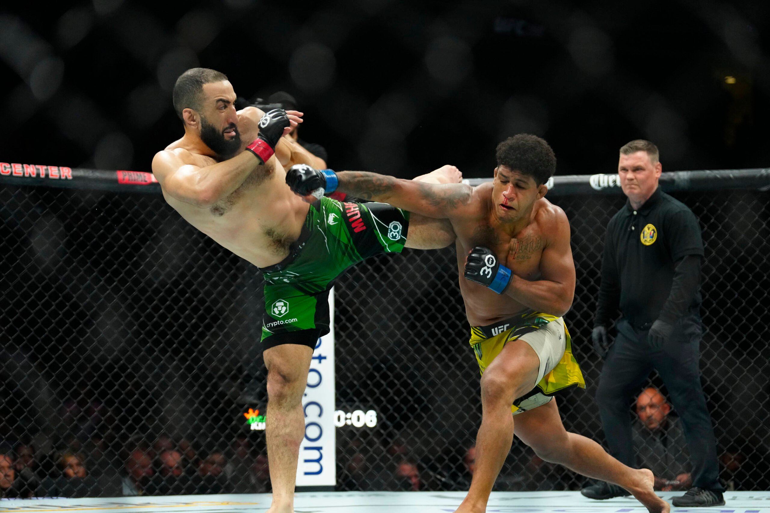 Gilbert Burns throws a punch at Belal Muhammad at UFC 288.