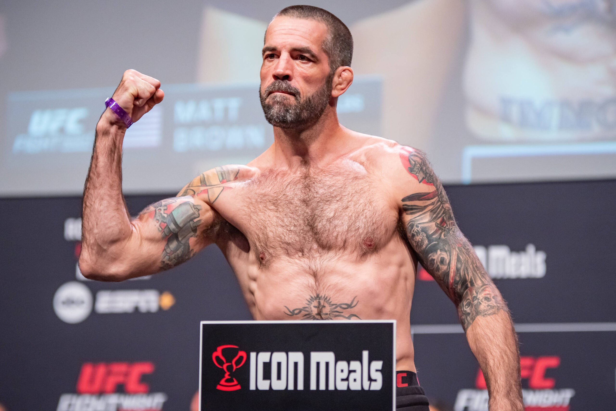 May 12, 2023, Charlotte, NC, North Carolina, USA: CHARLOTTE, NORTH CAROLINA - May 12: Matt Brown poses on the scales at ceremonial weigh ins ahead ...