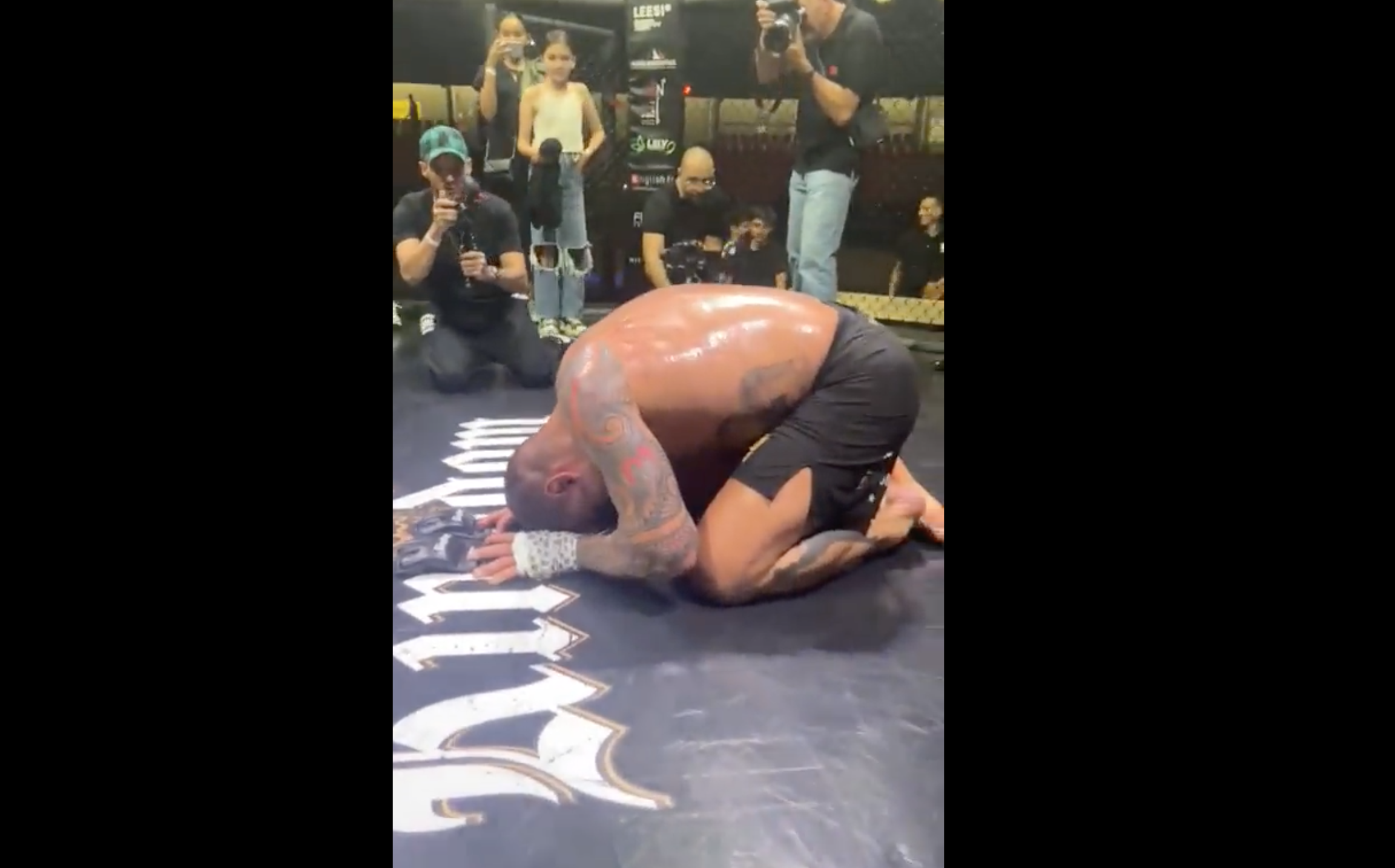 UFC veteran Antonio 'Bigfoot' Silva lays his gloves down in the cage, announcing his retirement.