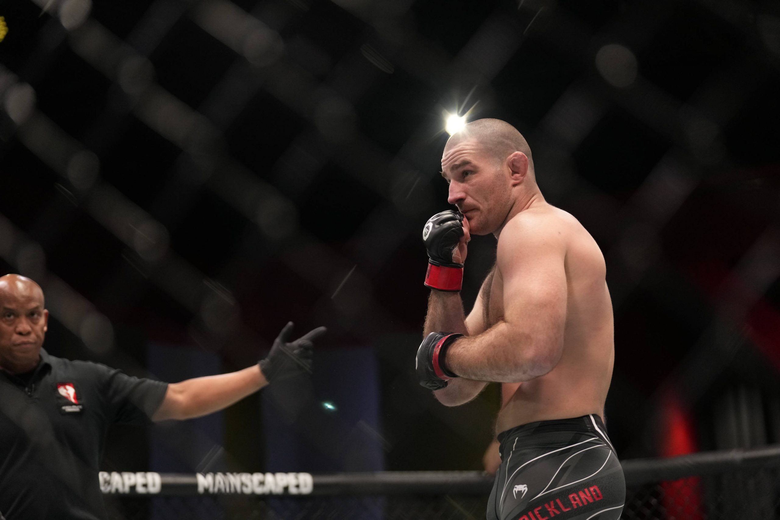 January 14, 2023, Las Vegas, NV, LAS VEGAS, NV, United States: LAS VEGAS, NV - JANUARY 14: (R-L) Sean Strickland battles Nassourdine Imavov in thei...