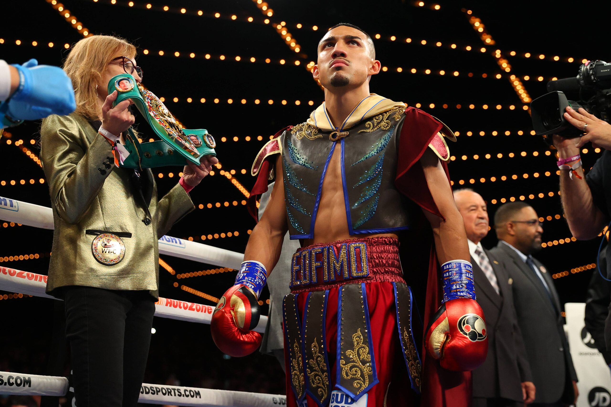 Teofimo Lopez, with one of his belts.