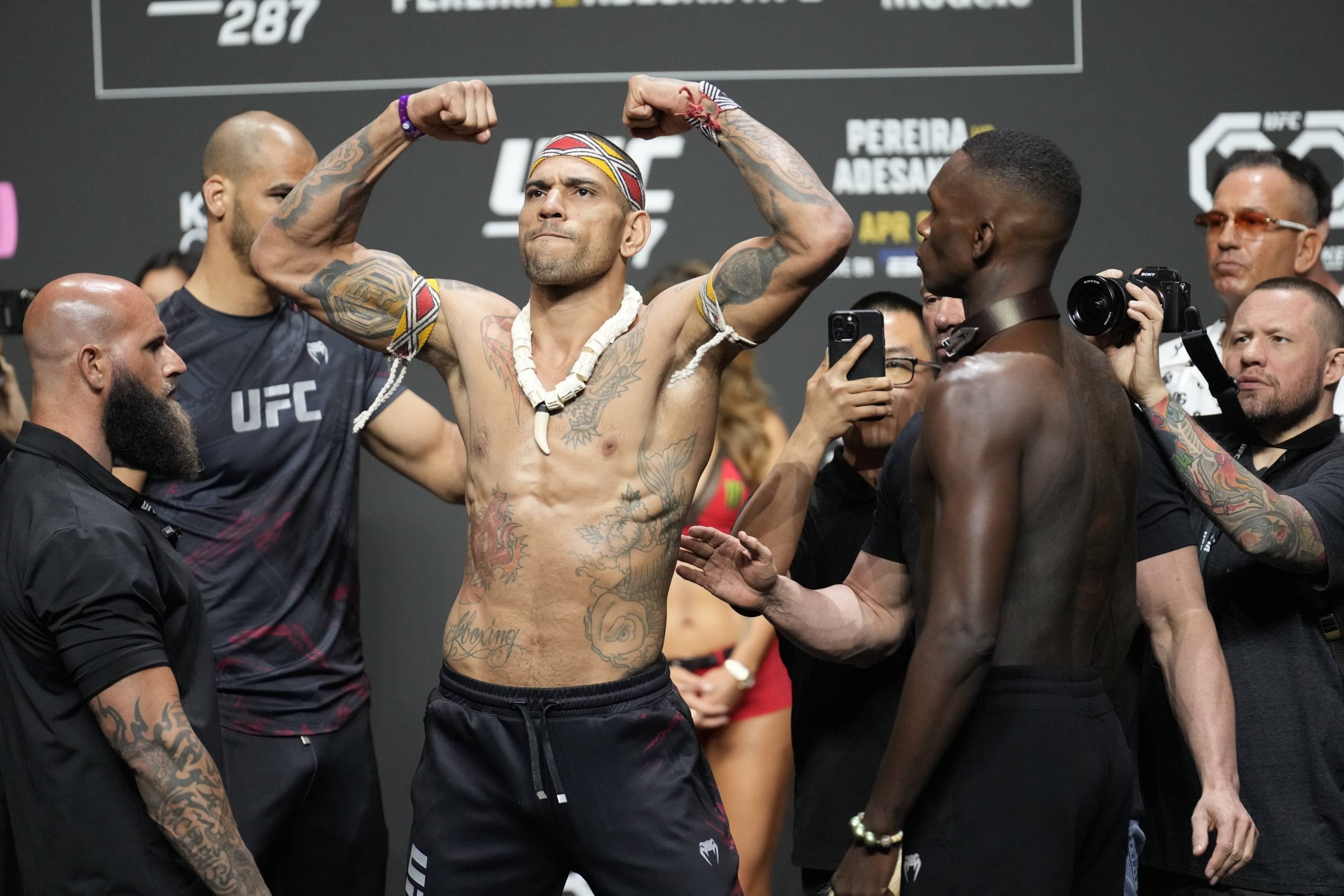 Alex Pereira and Israel Adesanya face-off following the ceremonial weigh-ins at UFC287 - Pereira v Adesanya 2 at Kaseya Center on April 7, 2023 in ...