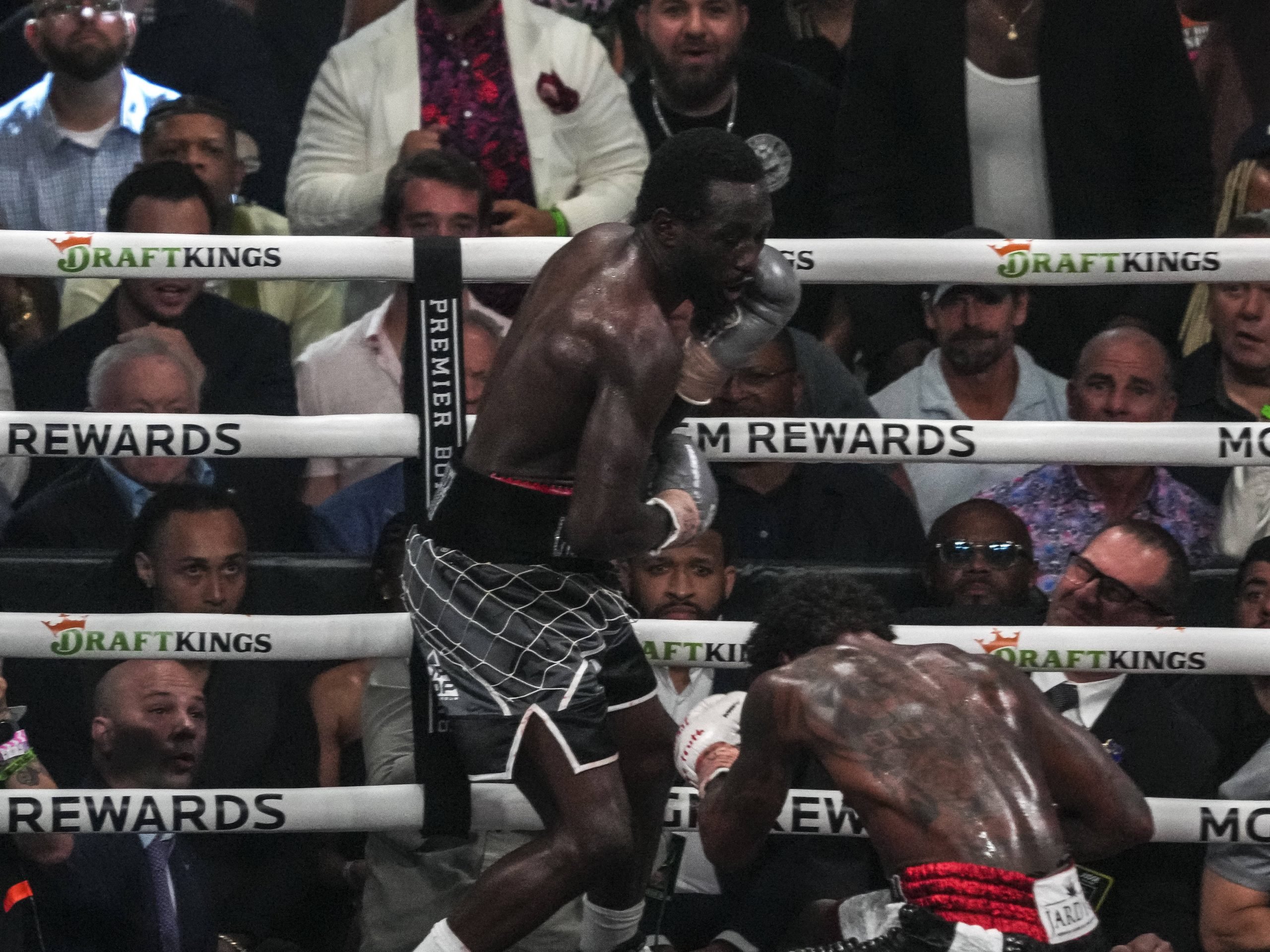 Terence Crawford looks on at a downed Errol Spence