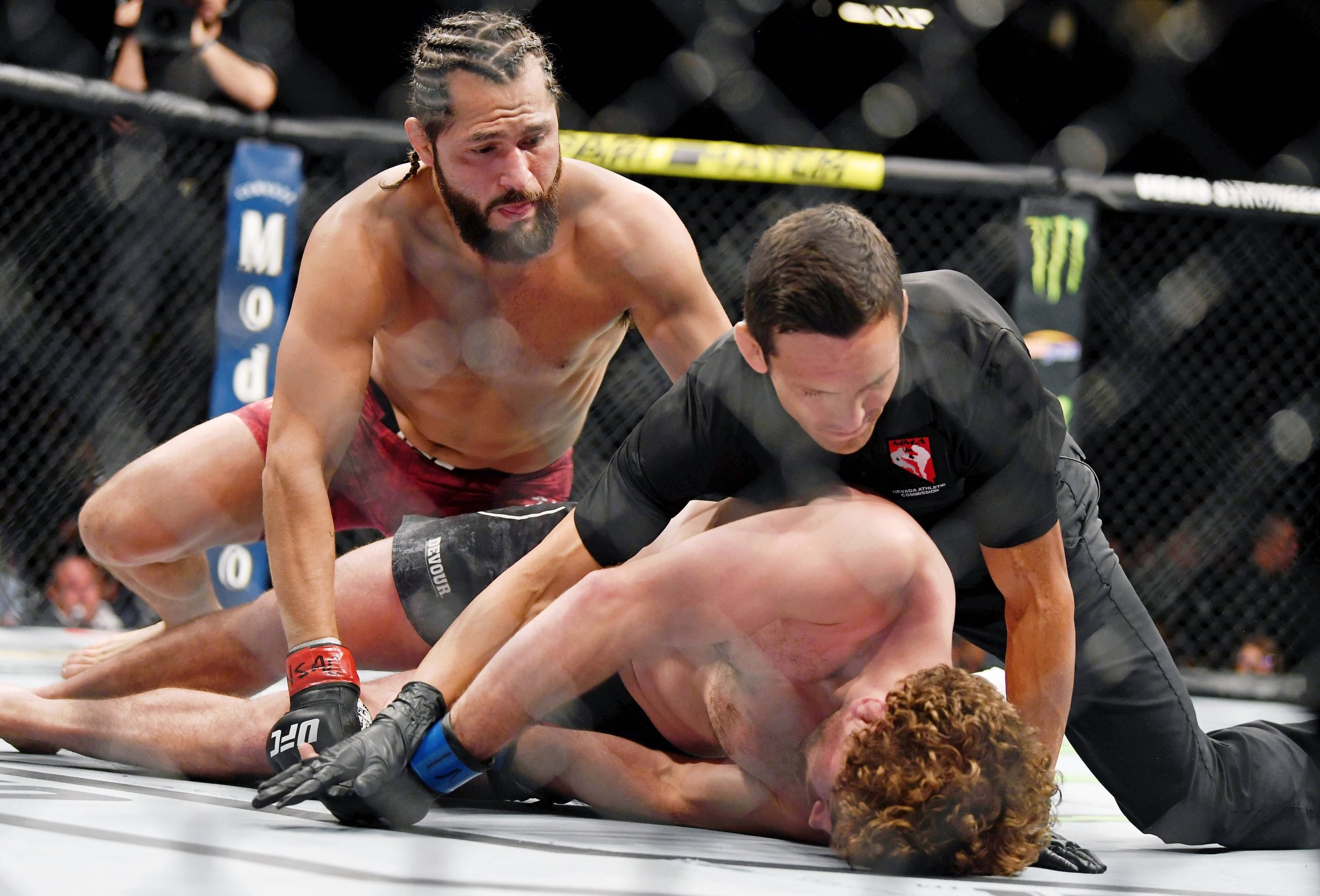 MMA: UFC 239-Masvidal vs Askren, Jul 6, 2019; Las Vegas, NV, USA; Jorge Masvidal (red gloves) punches Ben Askren (blue gloves) as referee Jason Her...