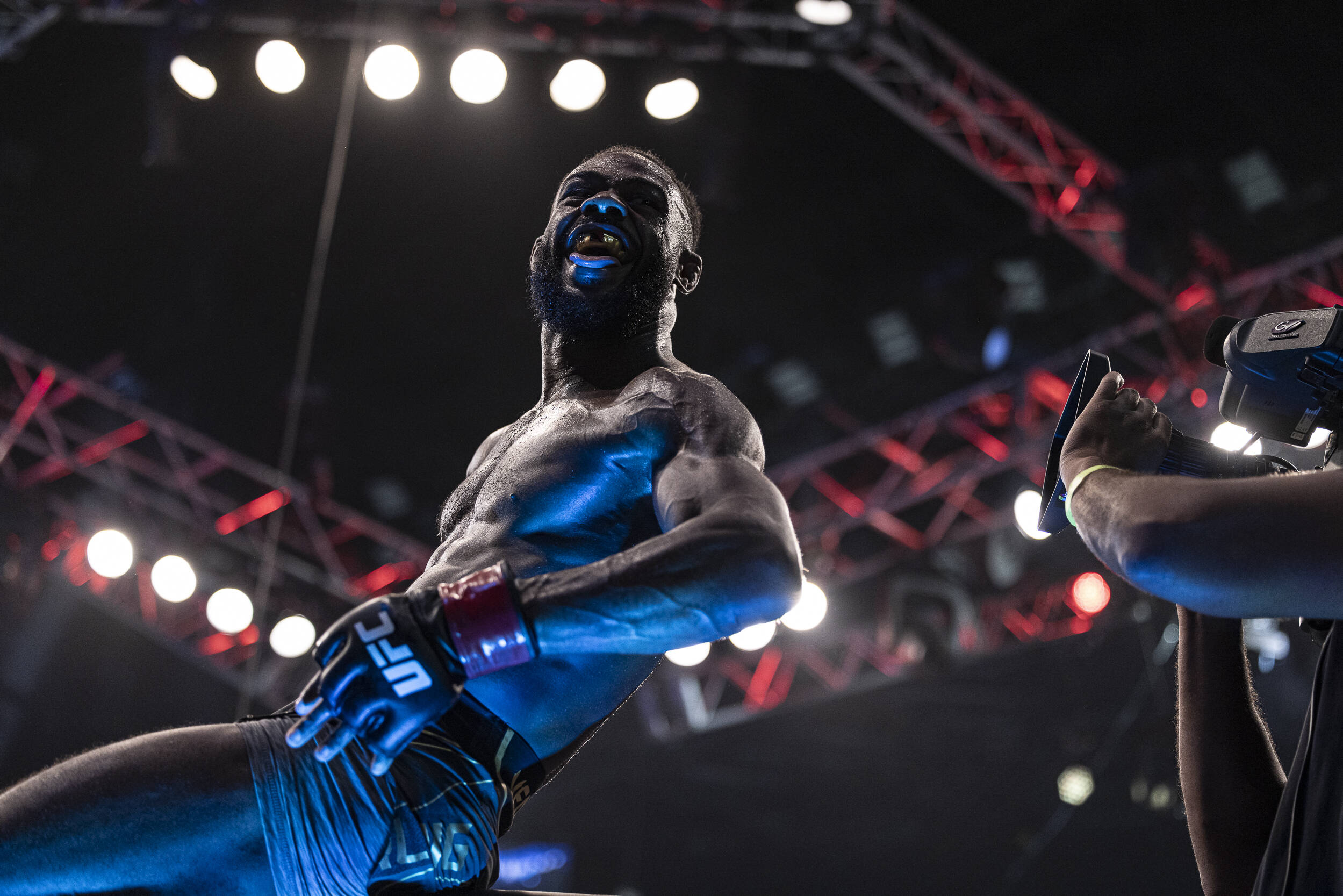MMA: UFC 280-Sterling vs Dillashaw Oct 22, 2022; Abu Dhabi, UAE; Aljamain Sterling (red gloves) celebrates after defeating T.J. Dillashaw (blue glo...