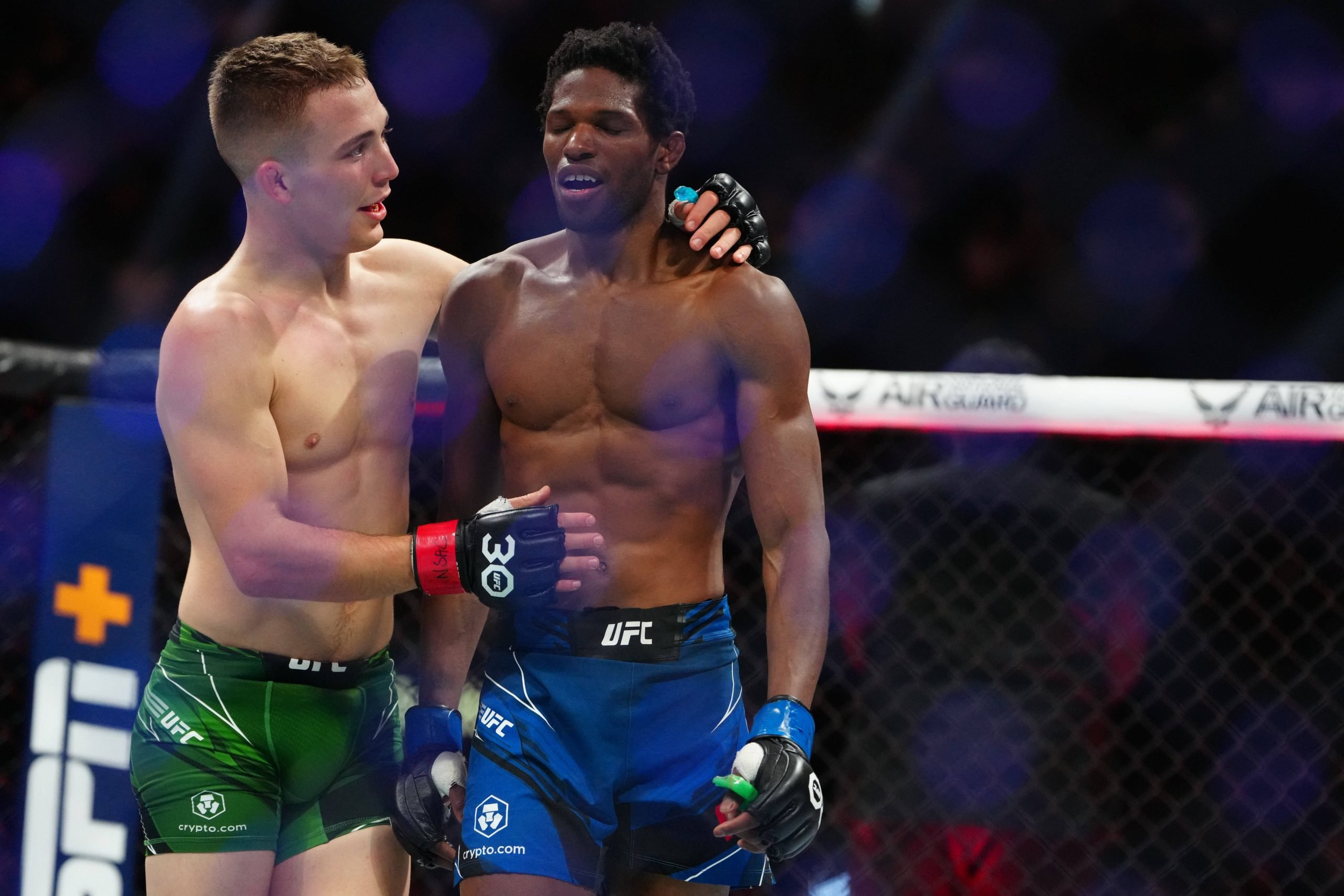 Cameron Saaiman consoles Terrence Mitchell at UFC 290. IMAGO/USA TODAY