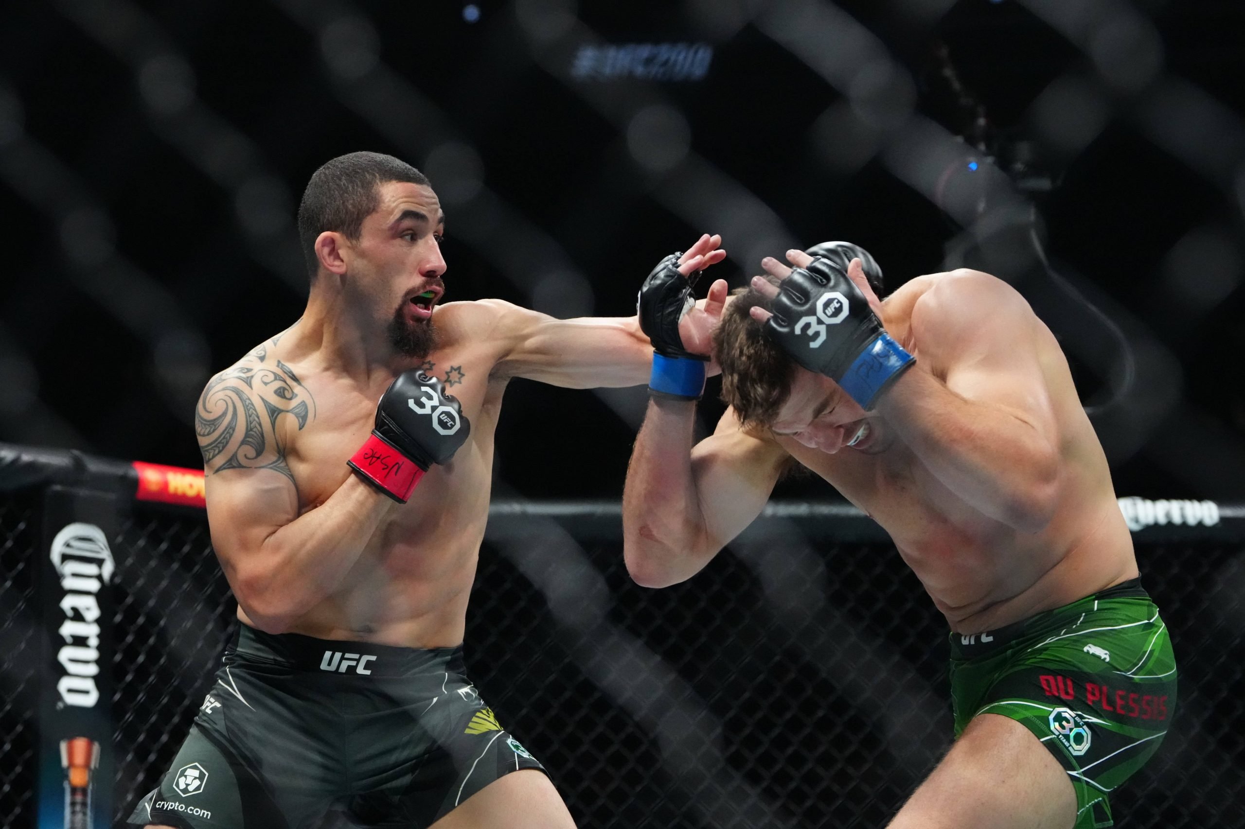 MMA: UFC 290 - Robert Whittaker vs Dricus Du Plessis Jul 8, 2023; Las Vegas, Nevada, USA; Robert Whittaker (red gloves) fights Dricus Du Plessis (b...