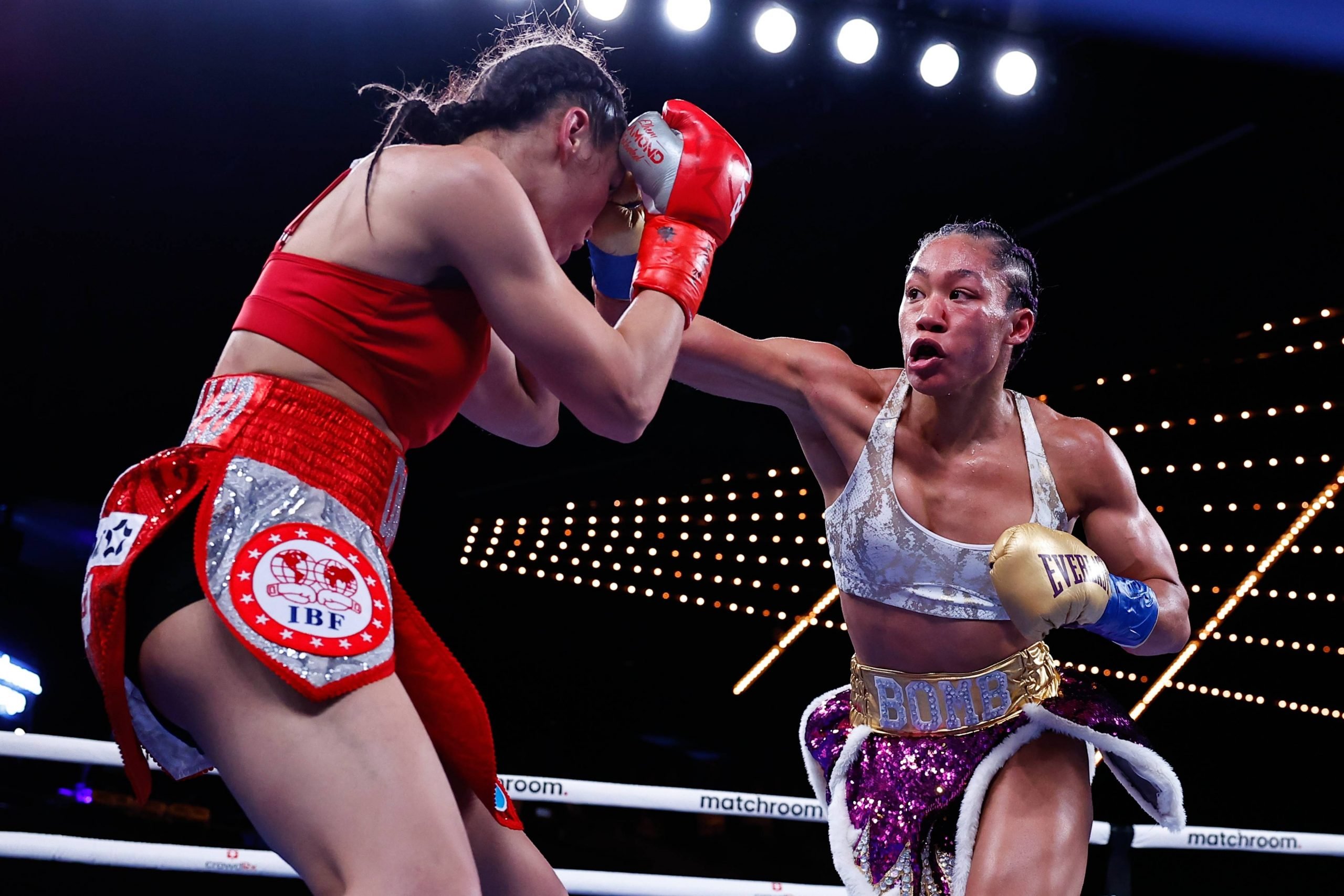 NEW YORK, NEW YORK - FEBRUARY 04: Alycia Baumgardner punches Elhem Mekhaled, during their fight for Baumgardner s WBC, WBO and IBF junior lightweig...