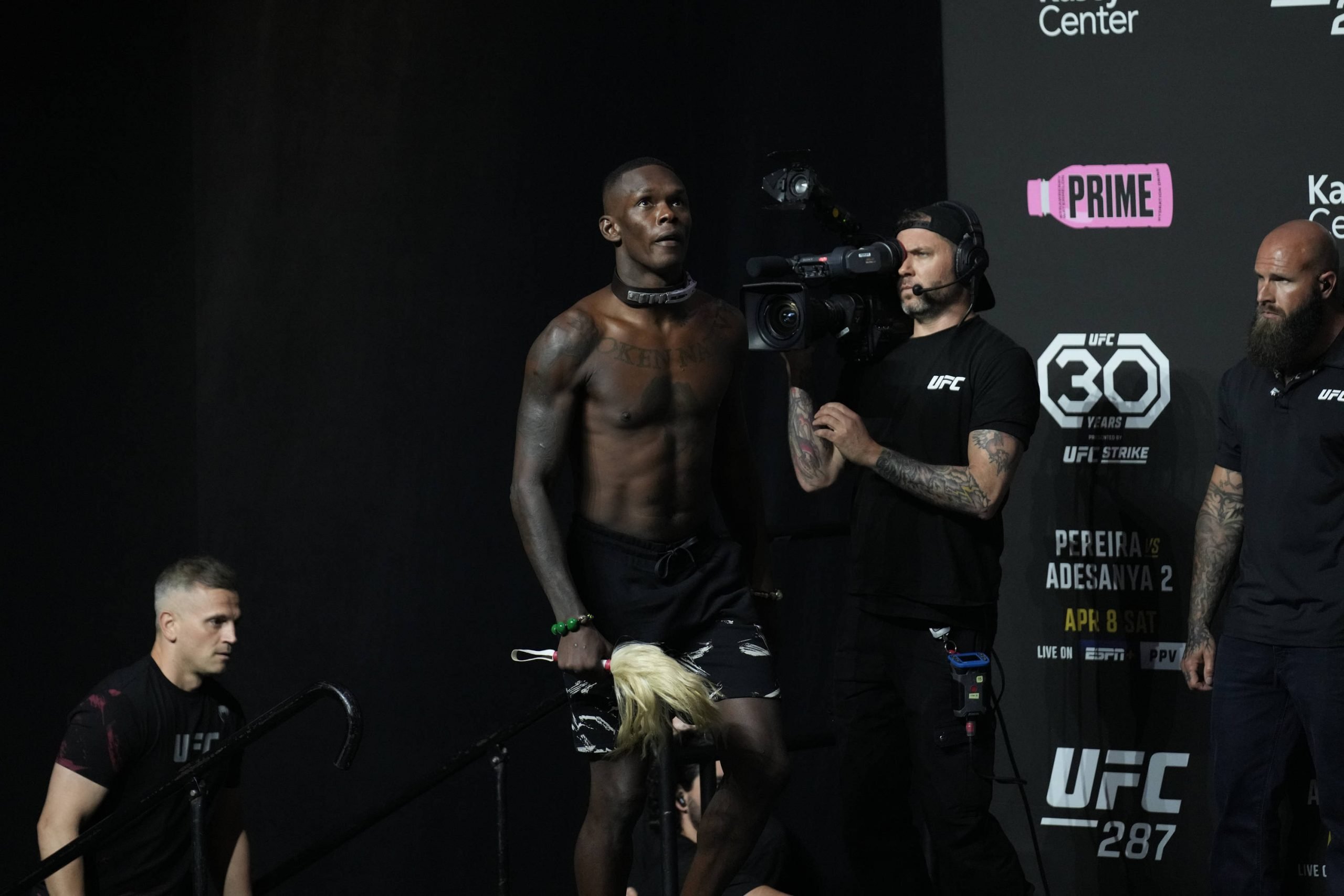 Israel Adesanya, who Sean Strickland hasn't seen fight, at UFC 287.