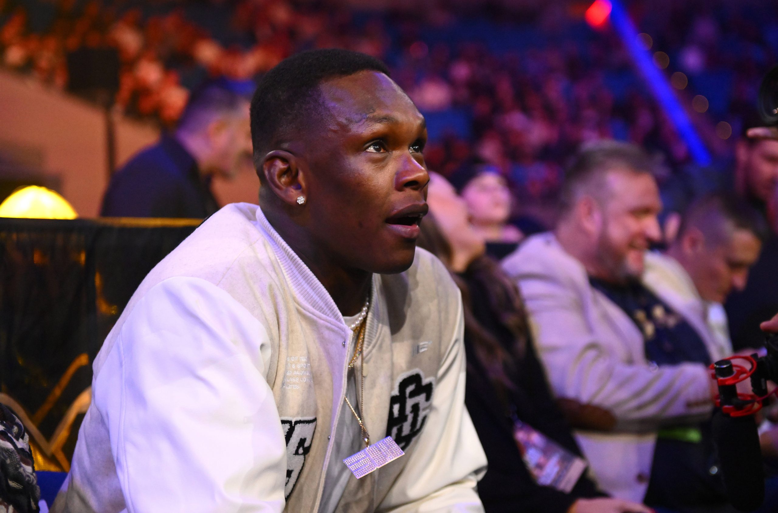 Israel Adesanya ringside for Tim Tszyu vs. Carlos Ocampo.