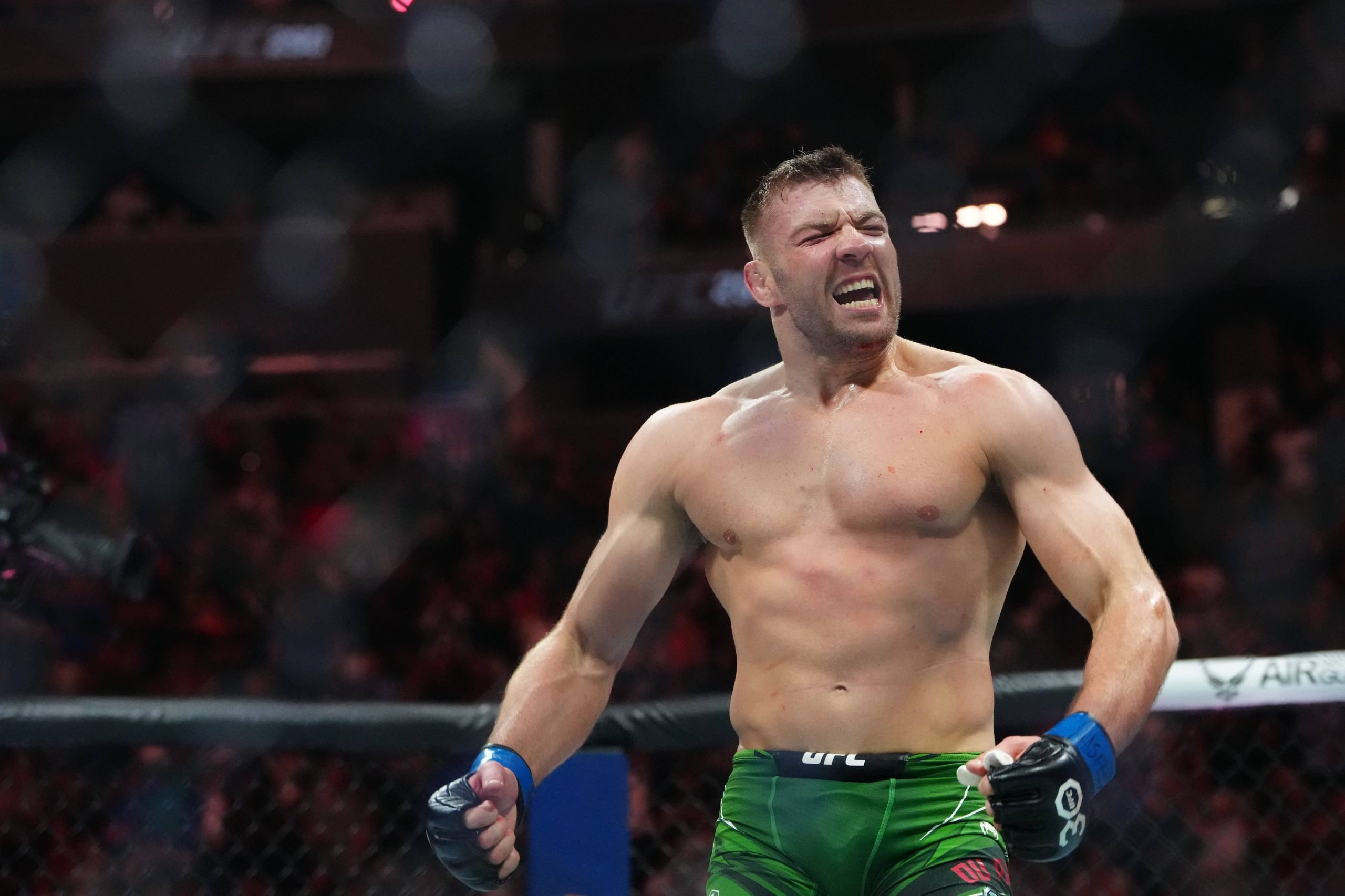 Dricus Du Plessis celebrates his win at UFC 290. Israel Adesanya