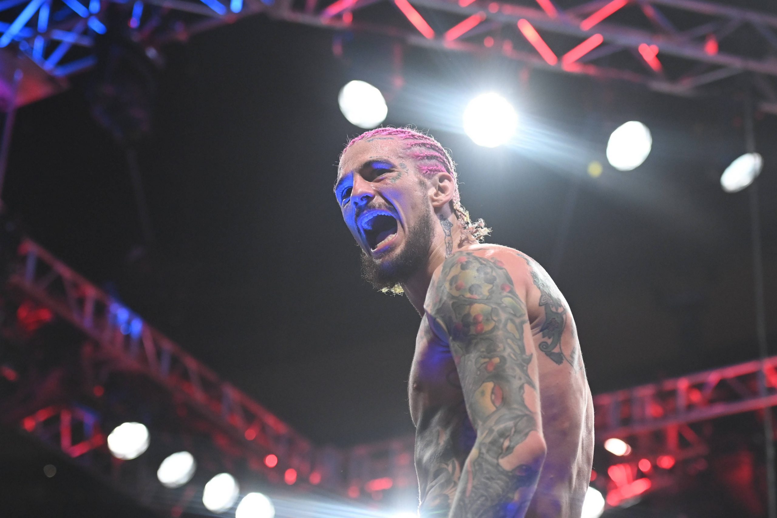 MMA: UFC 292 - Sterling vs Sean O'Malley Aug 19, 2023; Boston, MA, USA; Sean O'Malley (blue gloves) reacts to defeating Aljamin Sterling (red glove...