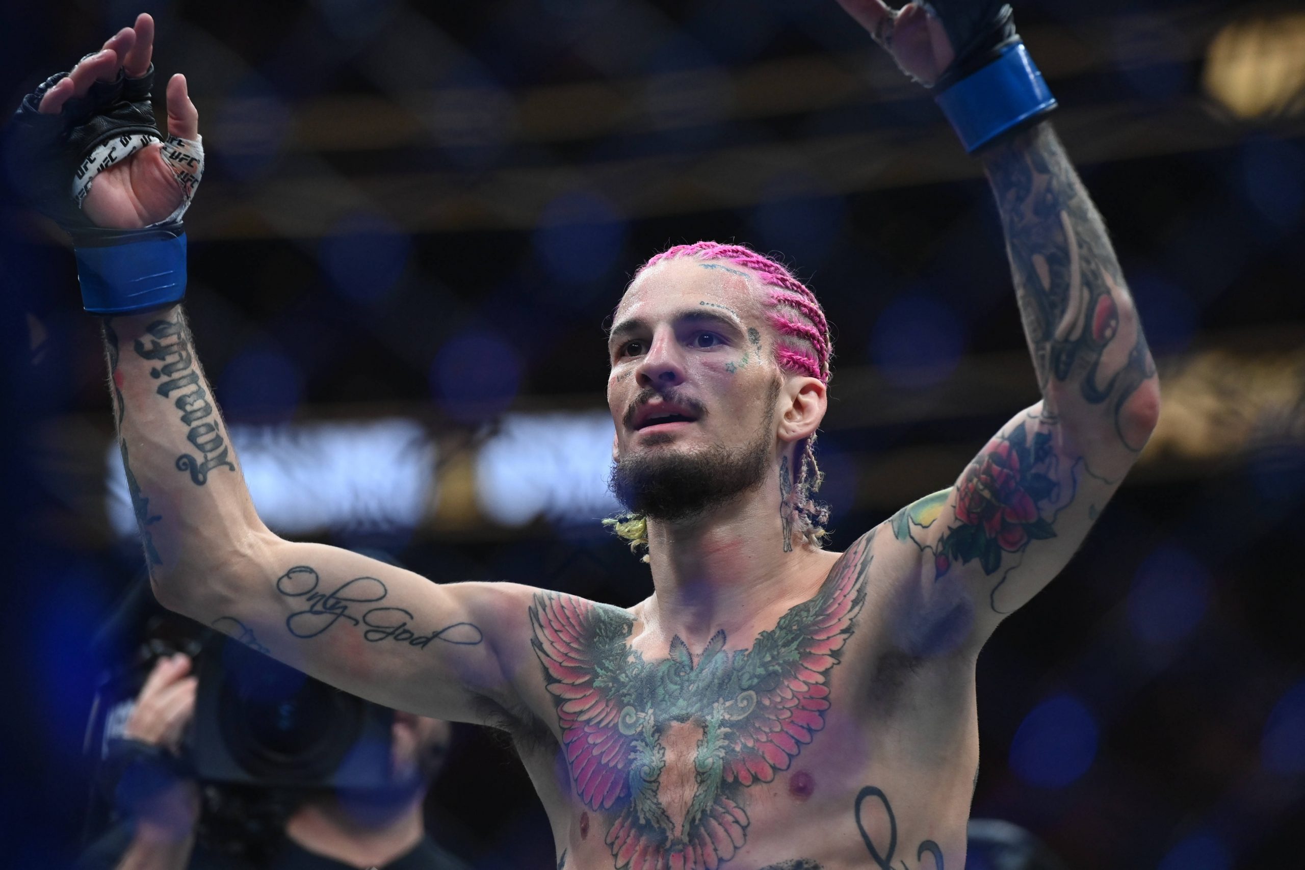 Sean O'Malley celebrates his title win at UFC 292.