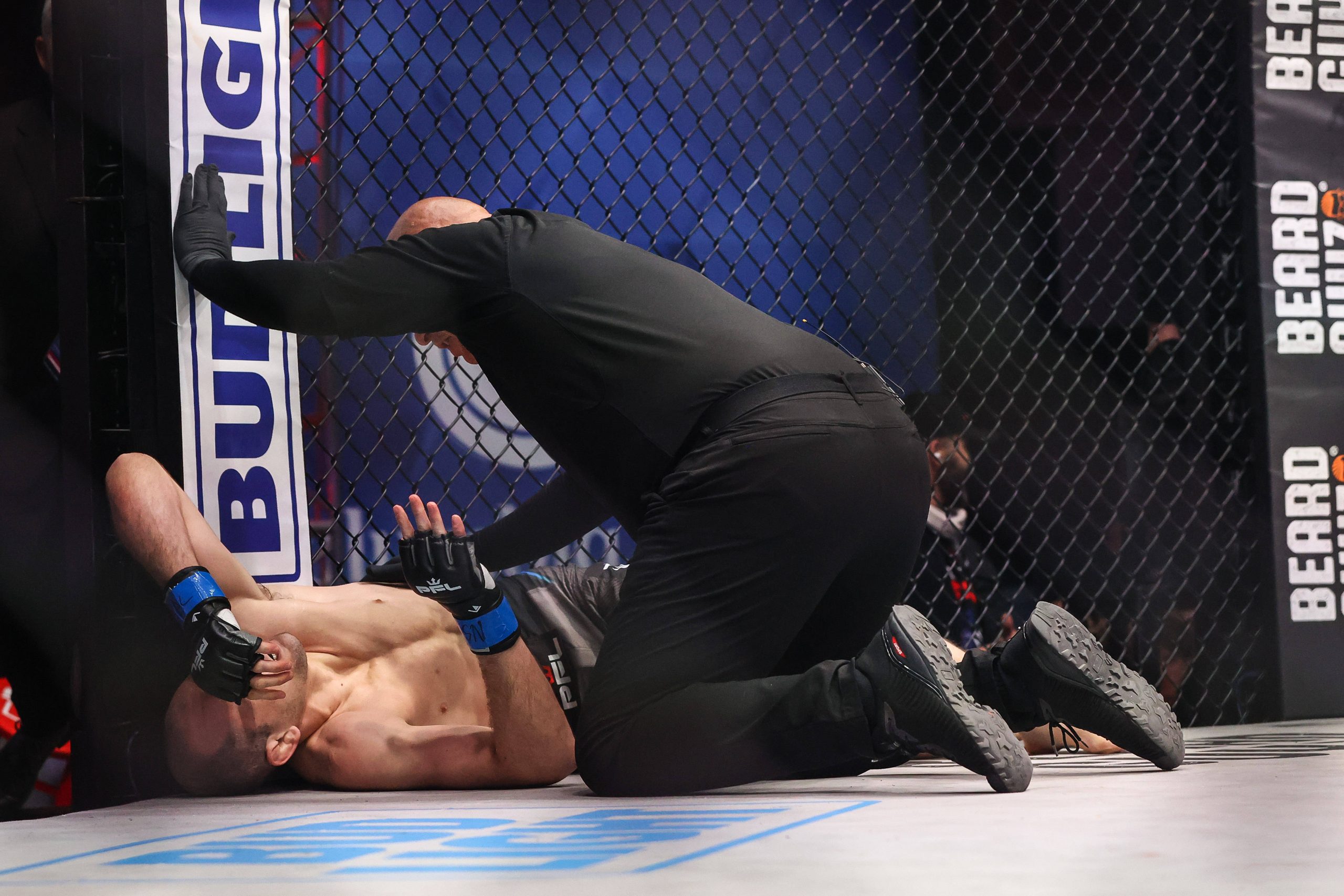 April 14, 2023: Sometime UFC Referee Chris Tognoni checks on Welterweight Ben Egli (L) at the conclusion of the PFL 3 Regular Season Fight Night at...