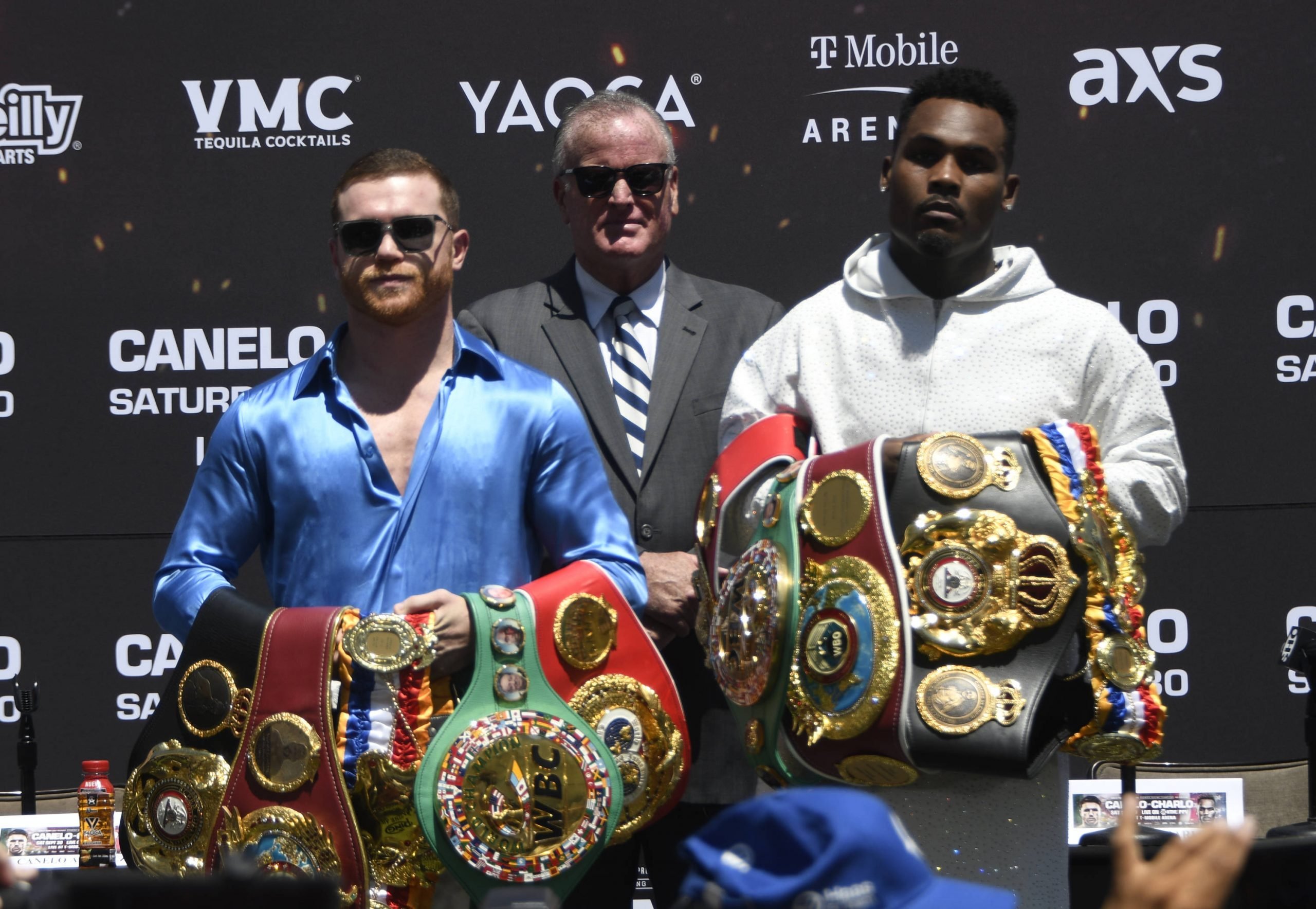 Canelo Alvarez and Jermell Charlo with their belts ahead of their fight on Sept. 30, 2023.