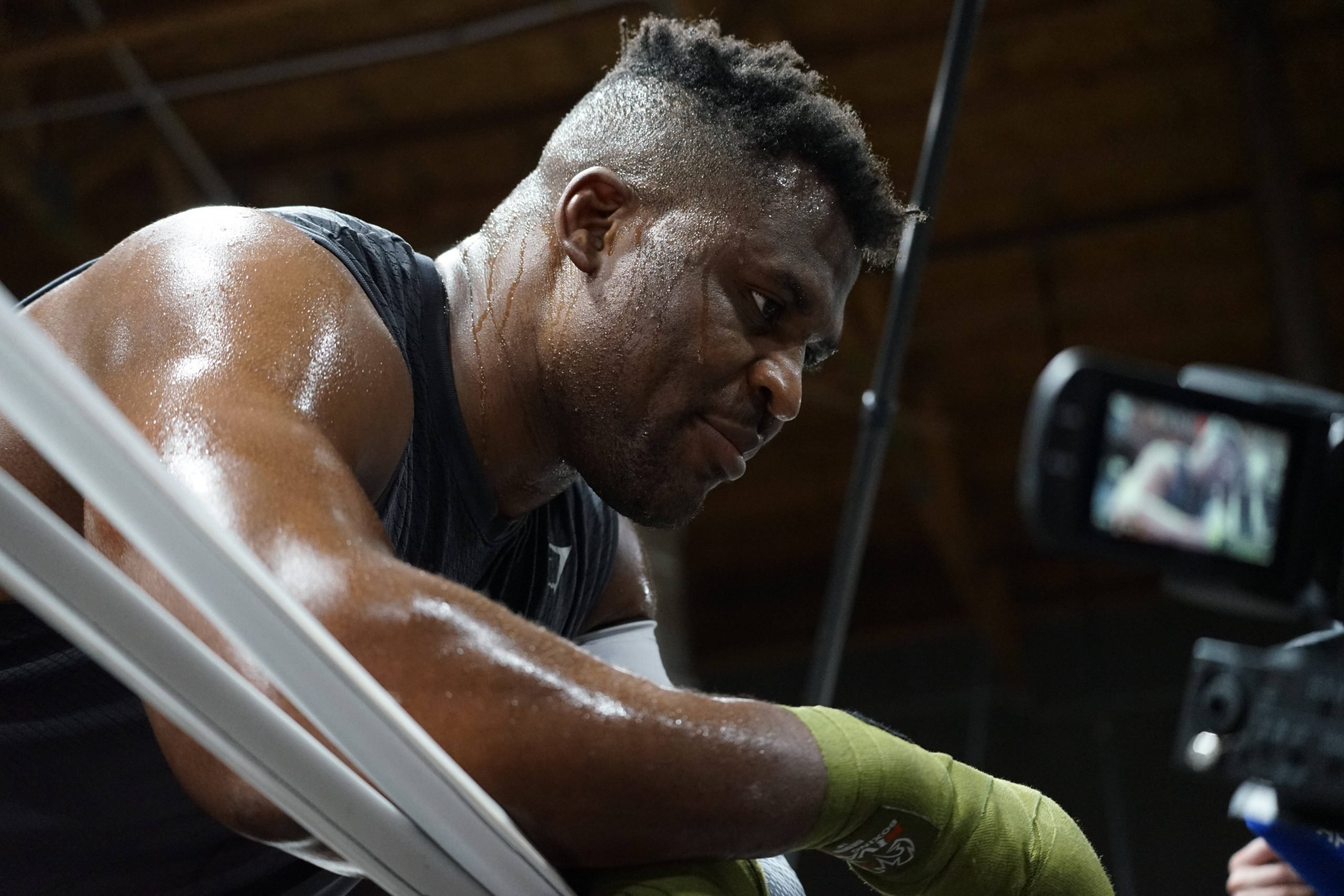 LAS VEGAS, NV - SEPTEMBER 26: Francis Ngannou trains with coaches Mike Tyson and Dewey Cooper at the Tyson Fury vs. Francis Ngannou open workout on...