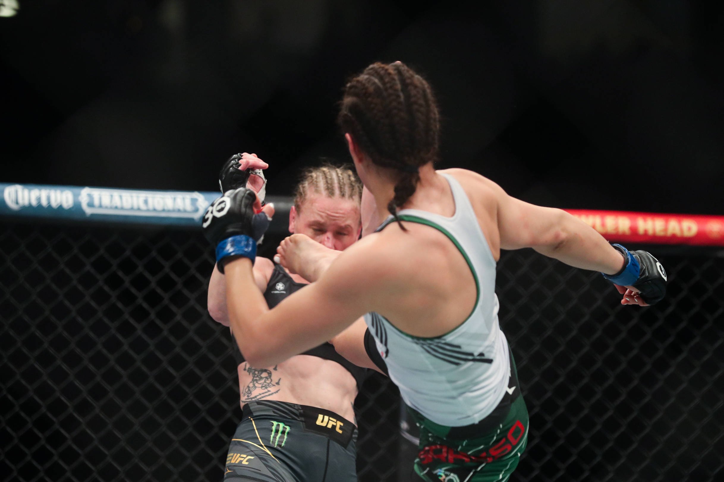 March 5, 2023, Las Vegas, Nevada, USA: ALEXA GRASSO (right) kicks VALENTINA SHEVCHENKO (left) during women s flyweight title fight at T-Mobile Aren...
