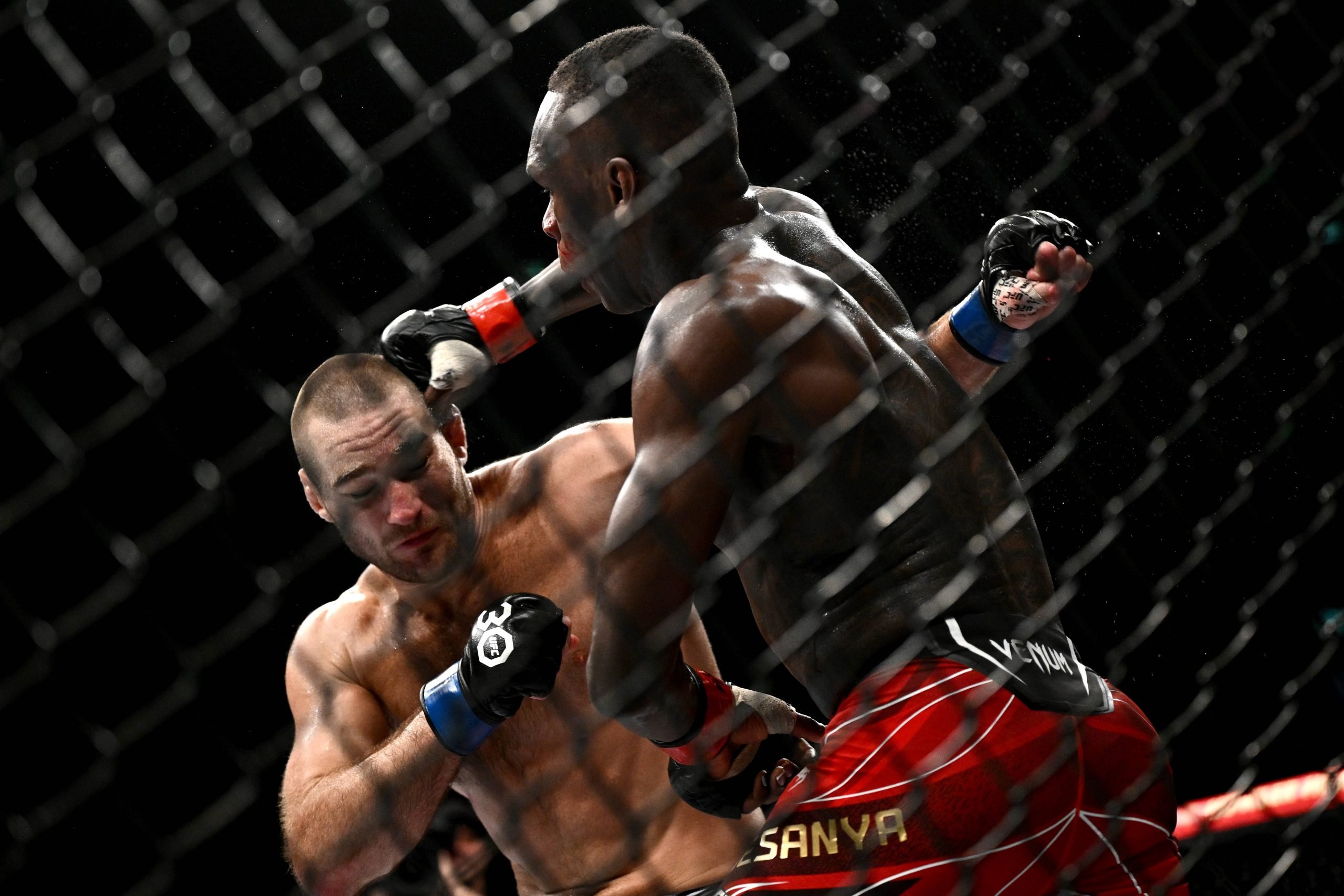 UFC 293 SYDNEY, Israel Adesanya of Nigeria (right) and Sean Strickland of the USA during the Middleweight Title bout of UFC 293 at Qudos Bank Arena...