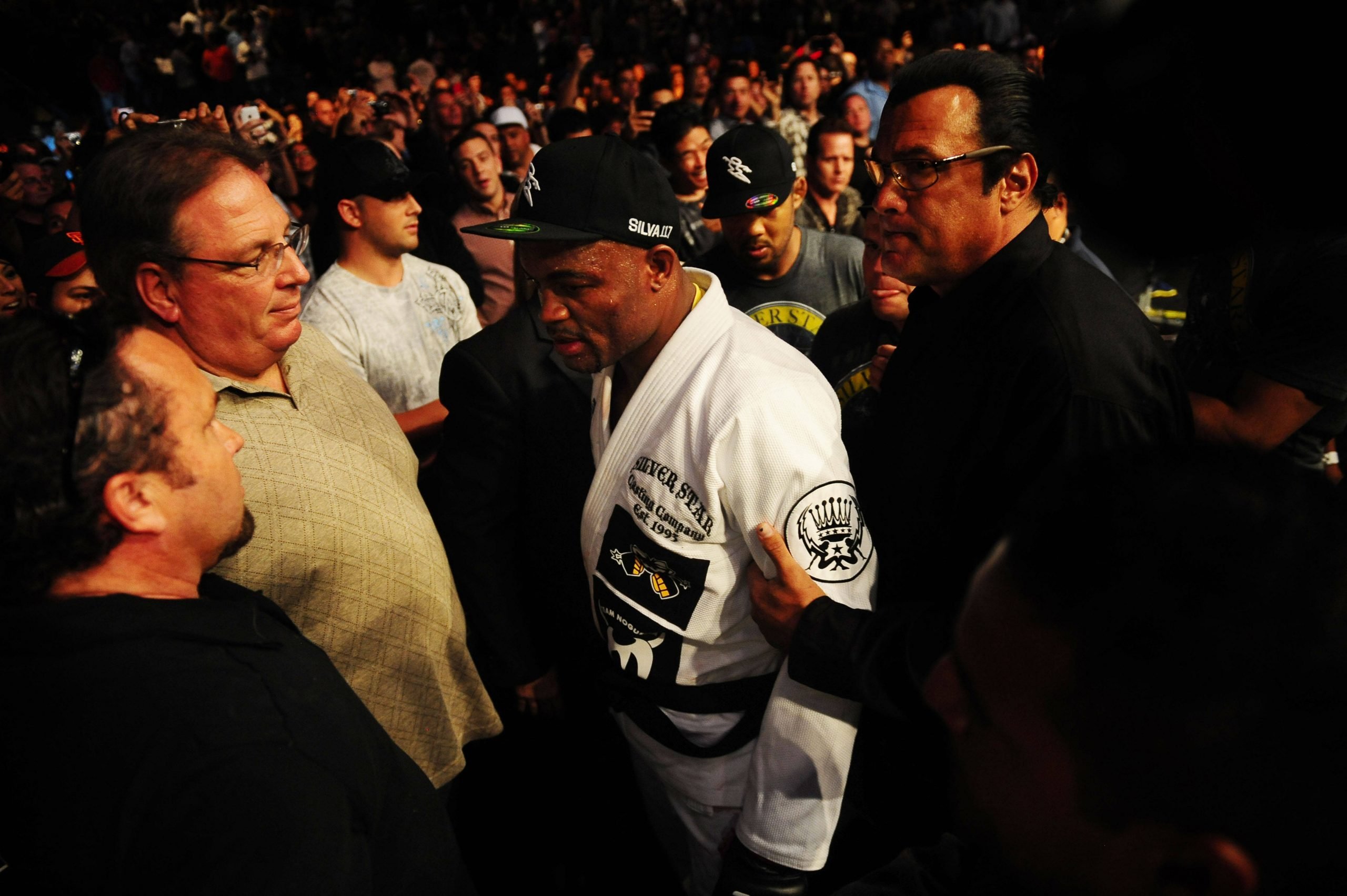 US PRESSWIRE Sports Aug. 7, 2010; Oakland, CA, USA; MMA fighter Anderson Silva (center) is congratulated by Steven Seagal (right) walks out of the ...