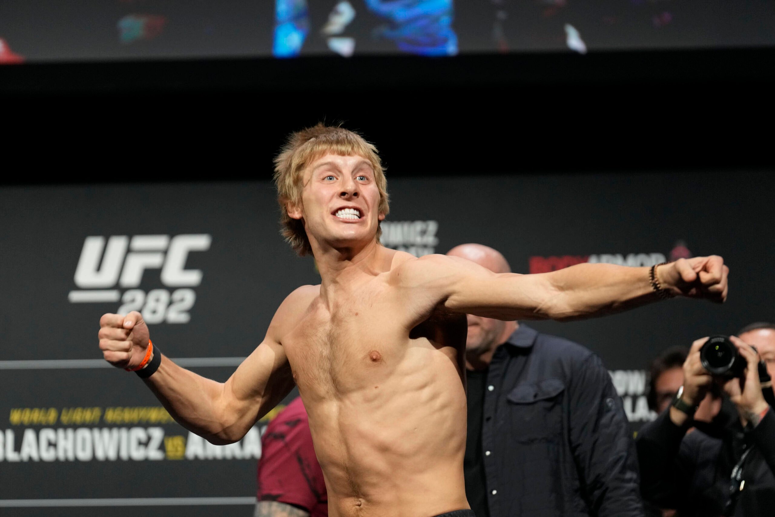 Paddy Pimblett pumps his fist at a UFC event