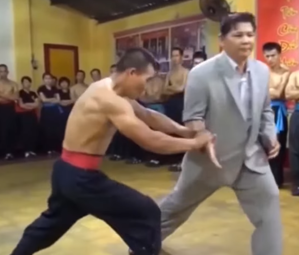 A fake master does a martial arts demonstration in Vietnam