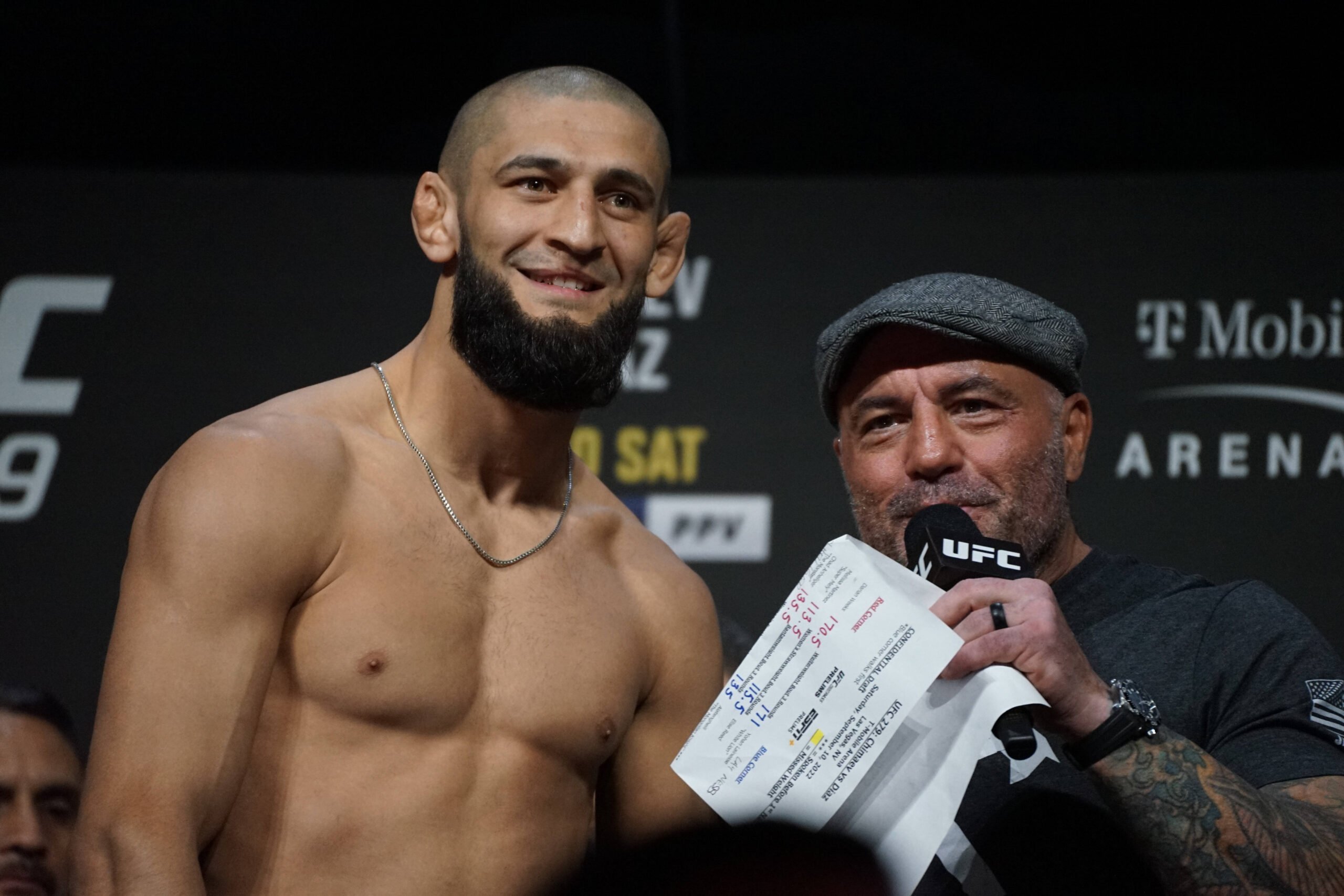 LAS VEGAS, NV - SEPTEMBER 9: Khamzat Chimaev (L) speaks to Joe Rogan (R) during the ceremonial UFC weigh-ins on September 9, 2022, at the MGM Grand...