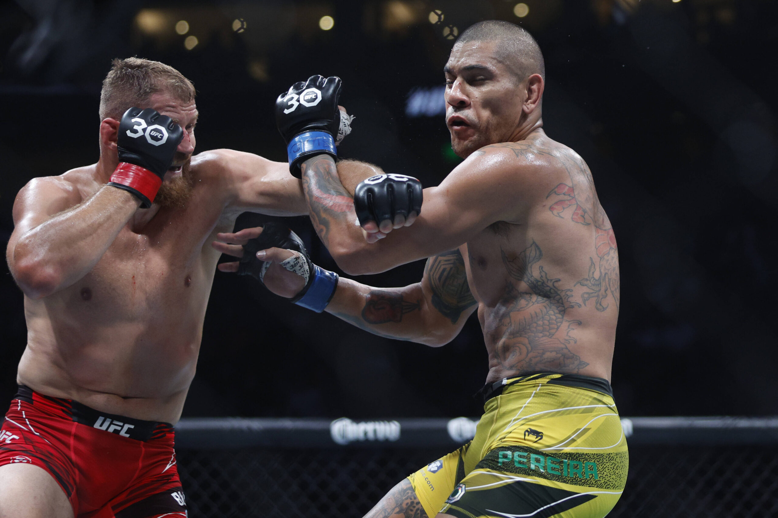 MMA: UFC 291 - Blachowicz vs Pereira Jul 29, 2023; Salt Lake City, Utah, USA; Jan Blachowicz (red gloves) fights Alex Pereira (blue gloves) during ...