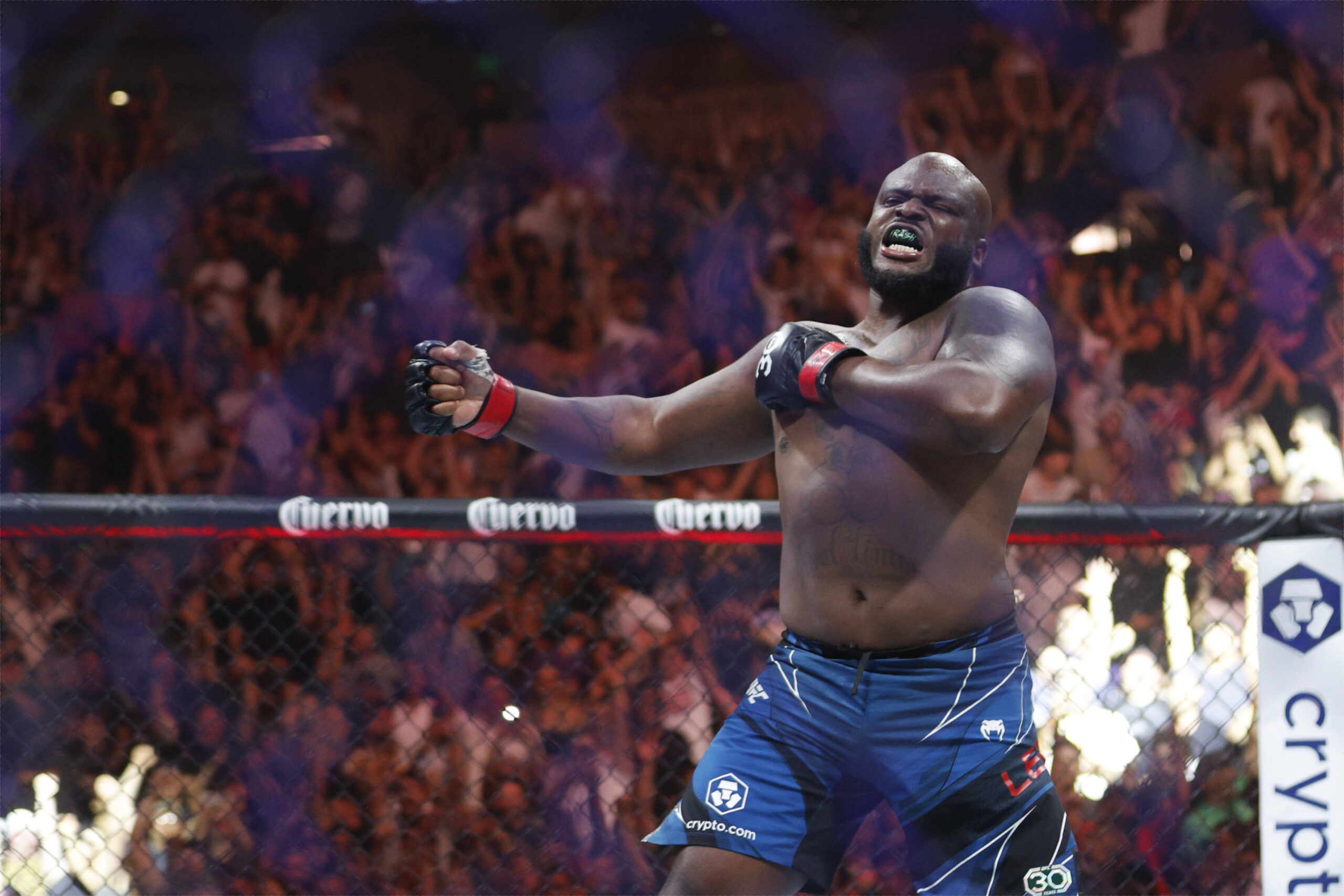 Derrick Lewis celebrates his win at UFC 291.
