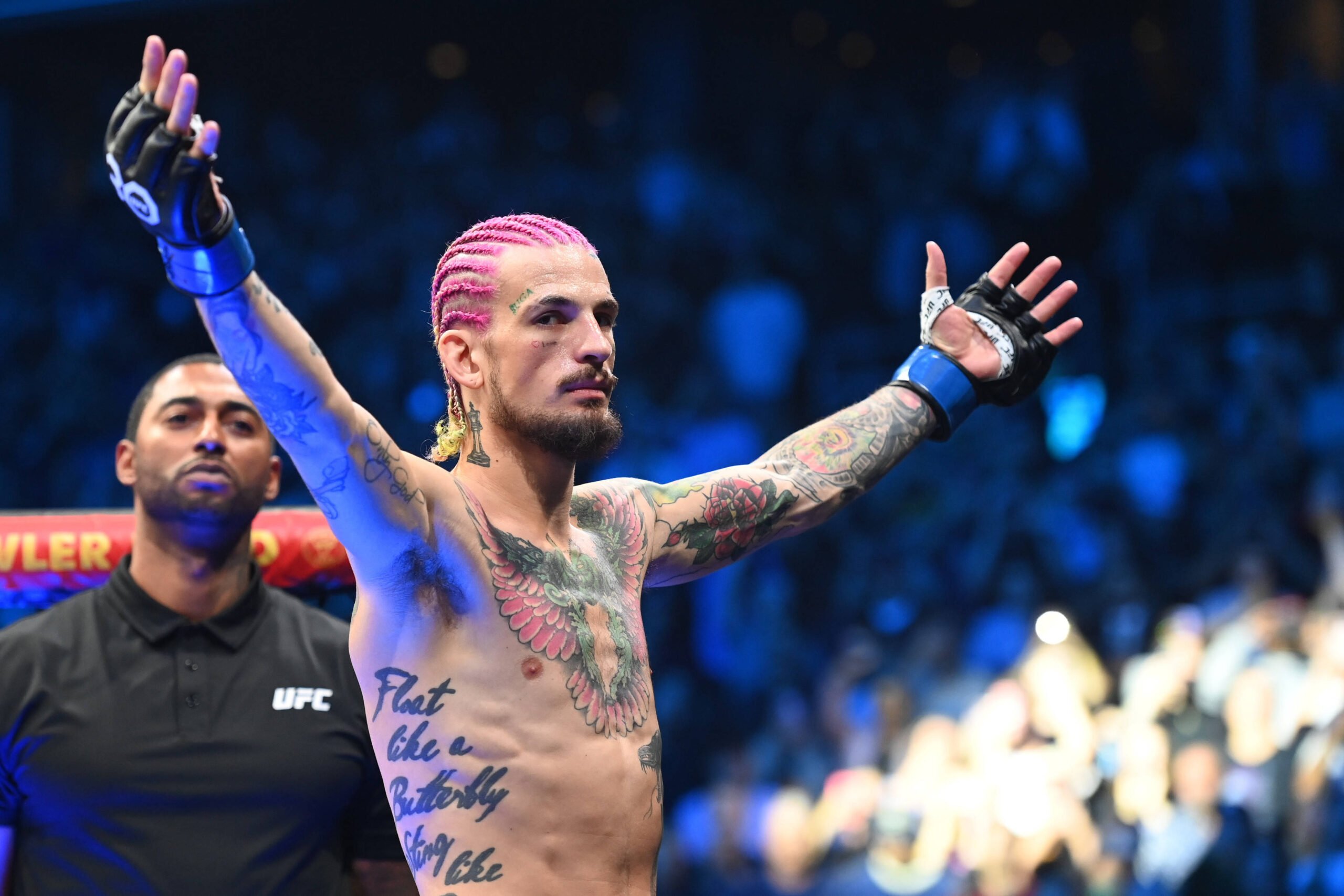 MMA: UFC 292 - Sterling vs O'Malley Aug 19, 2023; Boston, MA, USA; Sean O'Malley (blue gloves) prior to the fight against Aljamin Sterling (red glo...