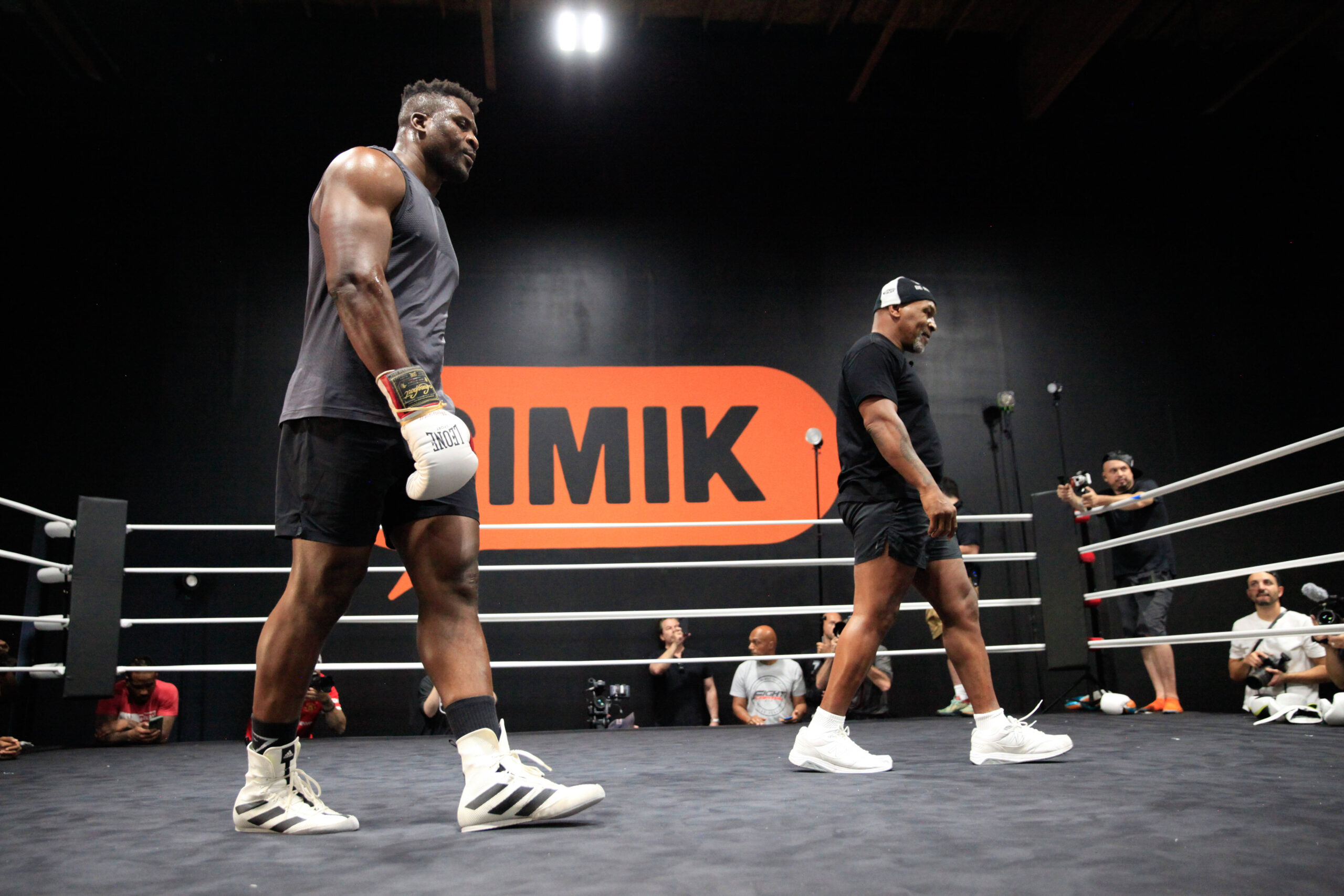 LAS VEGAS, NV - SEPTEMBER 26: Francis Ngannou trains with coach Mike Tyson at the Tyson Fury vs. Francis Ngannou open workout on September 26, 2023...
