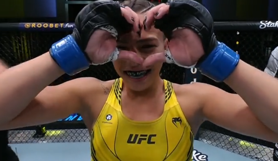UFC fighter Luana Santos celebrates her win over Juliana Miller.