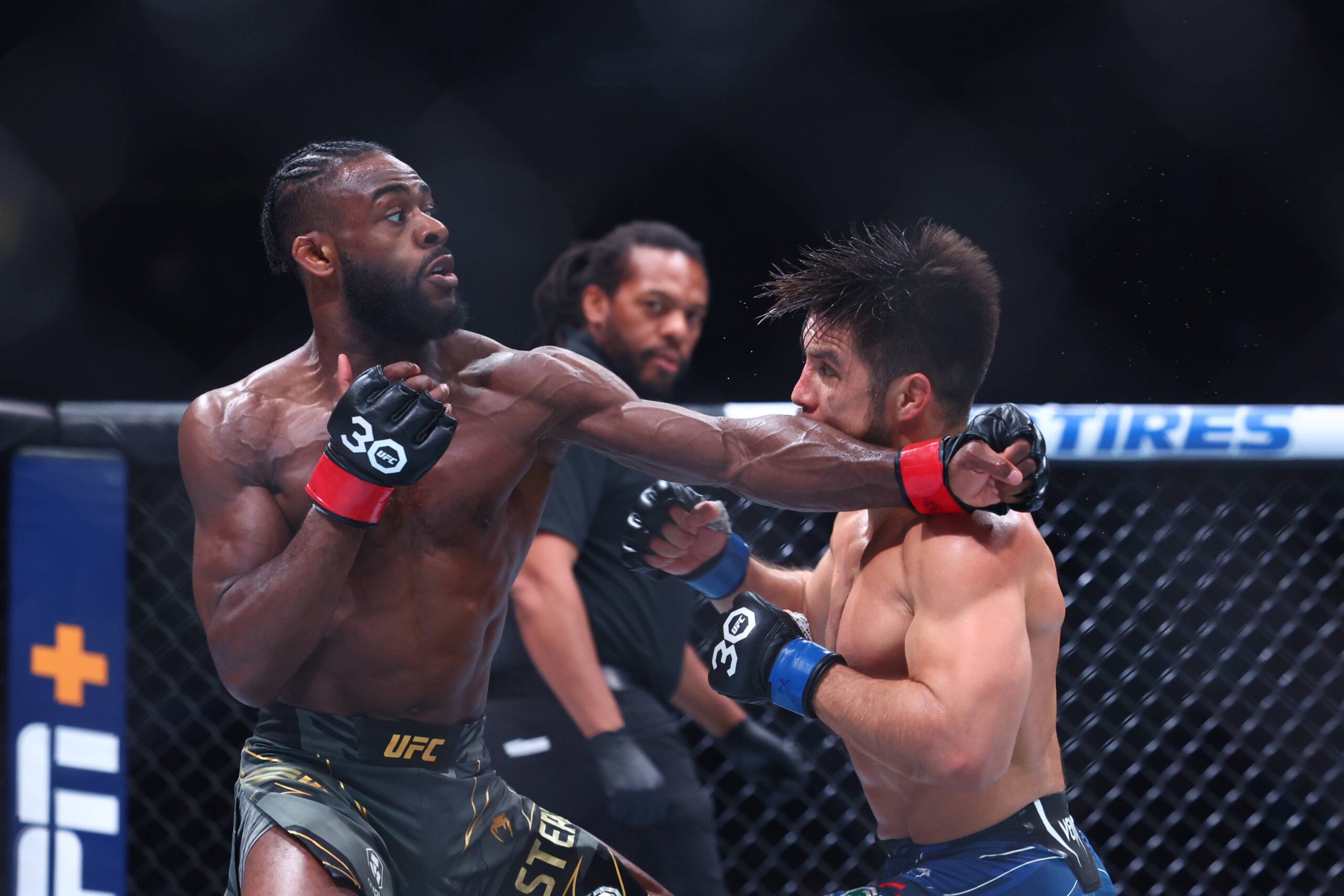 MMA: UFC 288 - Sterling vs Cejudo May 6, 2023; Newark, New Jersey, USA; Aljamain Sterling (red gloves) fights Henry Cejudo (blue gloves) during UFC...