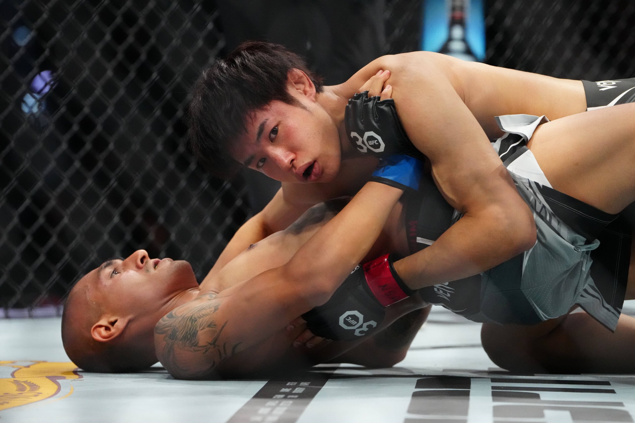 MMA: UFC 290 - Taira vs Chairez Jul 8, 2023; Las Vegas, Nevada, USA; Tatsuro Taira (red gloves) fights Edgar Chairez (blue gloves) during UFC 290 a...