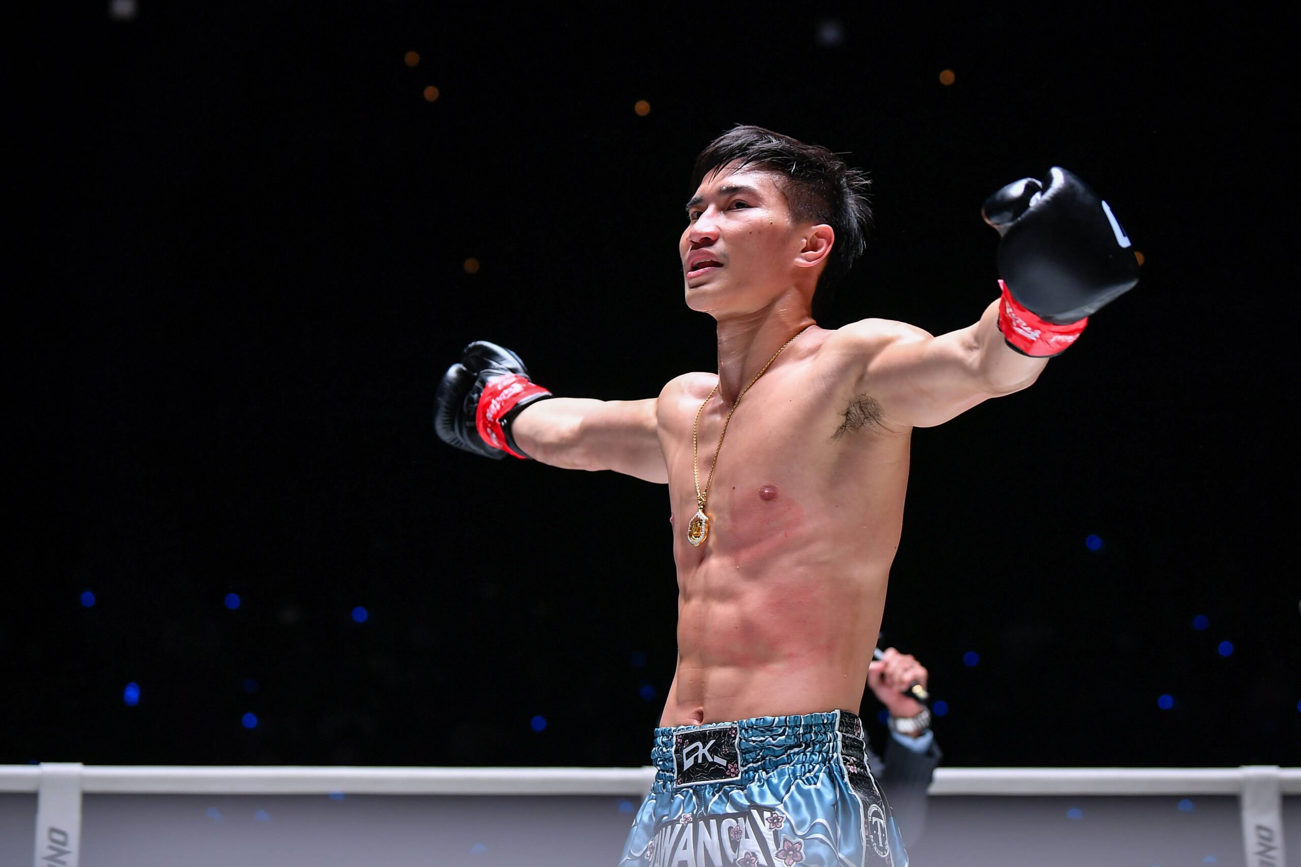October 7, 2023, Bangkok, Thailand: Tawanchai PK Saenchai of Thailand waves at the crowd during the One fight night 15 at Lumpinee Boxing Stadium. ...