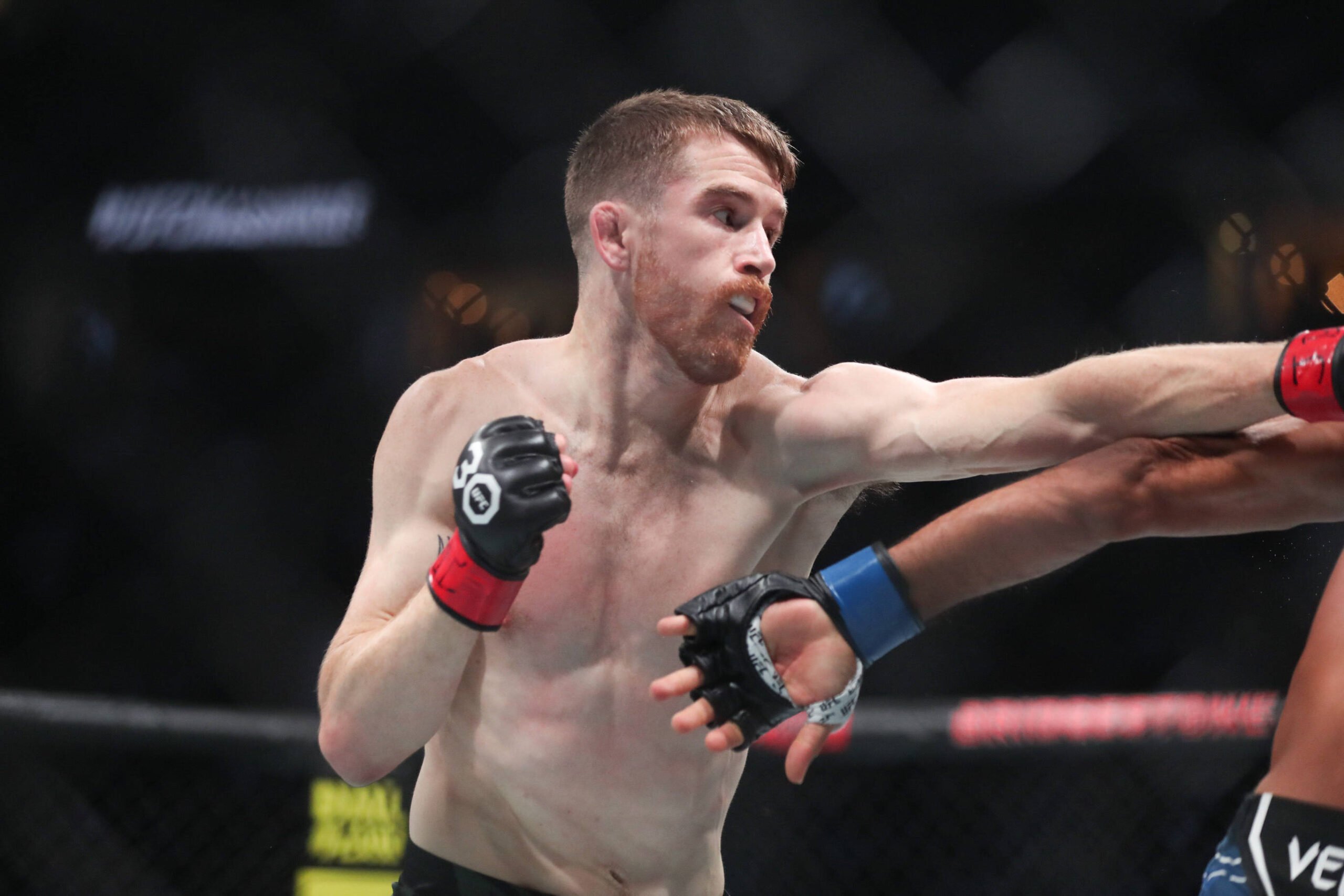 August 5, 2023, Nashville, TN, USA: CORY SANDHAGEN punches ROB FONT during Catchweight bout at Bridgestone Arena in Nashville, TN. Nashville USA - ...