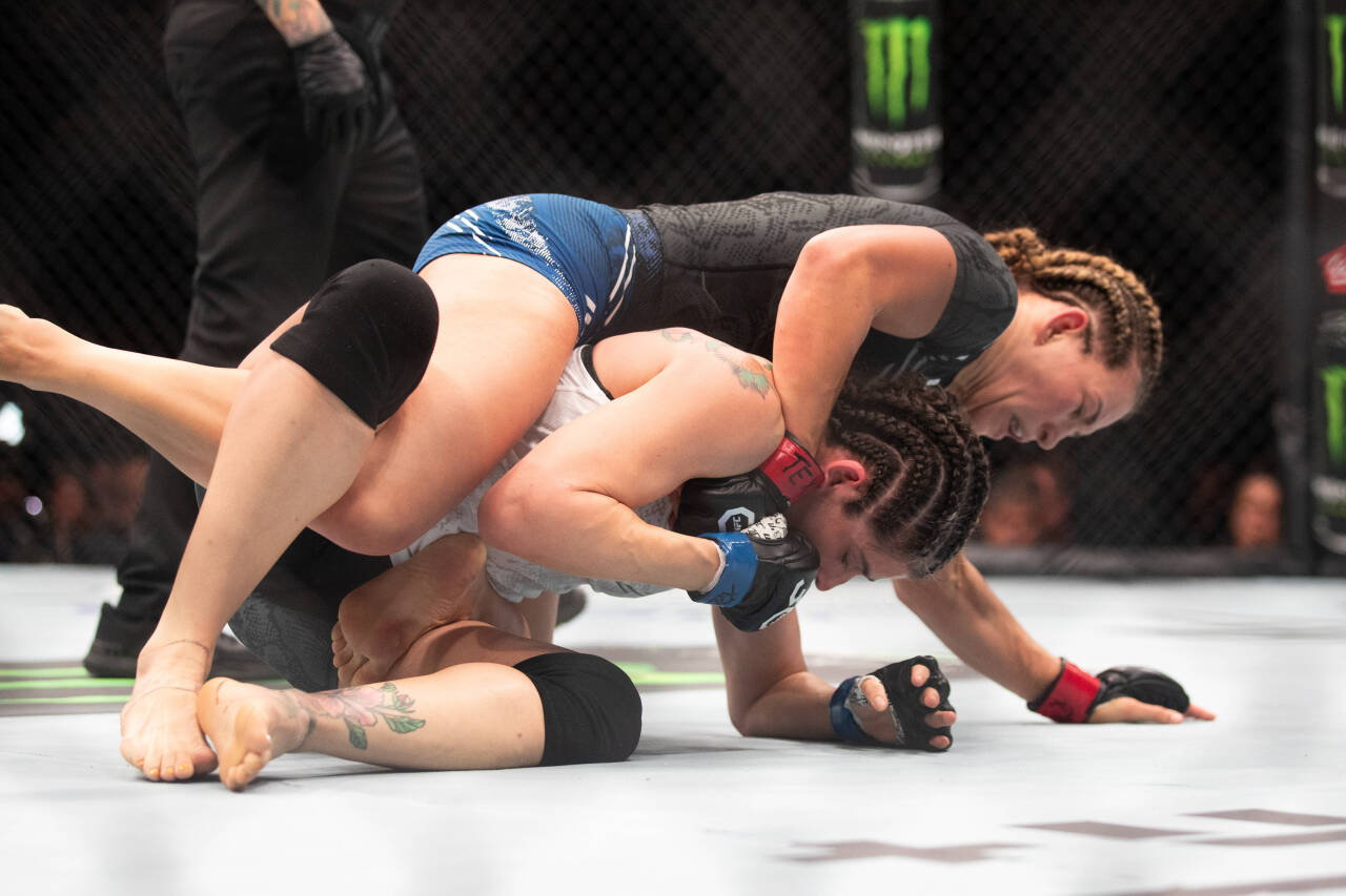 December 2, 2023, AUSTIN, TEXAS, United States: Austin, TX- Miesha Tate attempts submisson on Julia Avila in Women s Bantamweight Bout during UFC F...