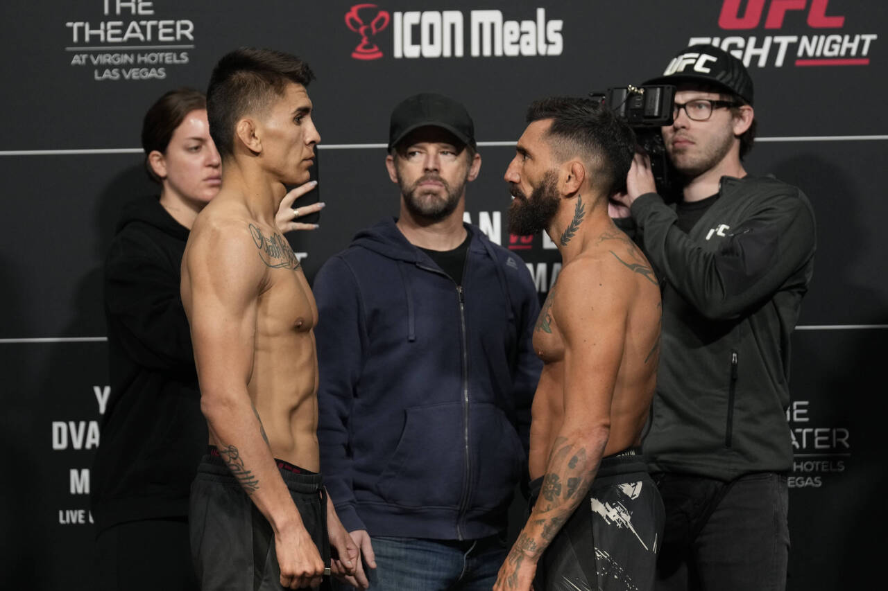 LAS VEGAS, NV - MARCH 10: (L) Mario Bautista and Guido Cannetti face-off following the official weigh-ins at UFC Apex for UFC Fight Night - Vegas 7...