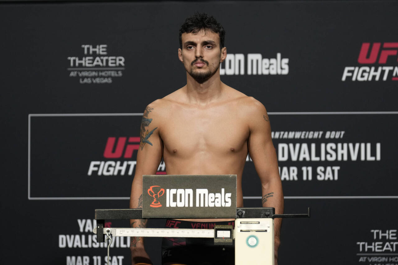 March 10, 2023, Las Vegas, NV, LAS VEGAS, NV, United States: LAS VEGAS, NV - MARCH 10: Ricardo Ramos steps on the scale for the official weigh-ins ...