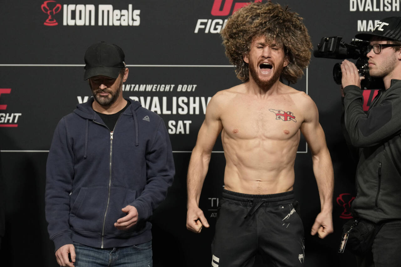 March 10, 2023, Las Vegas, NV, LAS VEGAS, NV, United States: LAS VEGAS, NV - MARCH 10: Merab Dvalishvili face-off and get into a pushing match foll...